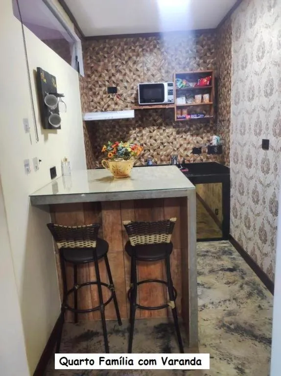 Kitchen or kitchenette in Sanctuary Pirenópolis Suítes e Flats