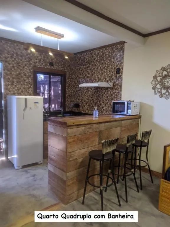 Kitchen or kitchenette in Sanctuary Pirenópolis Suítes e Flats