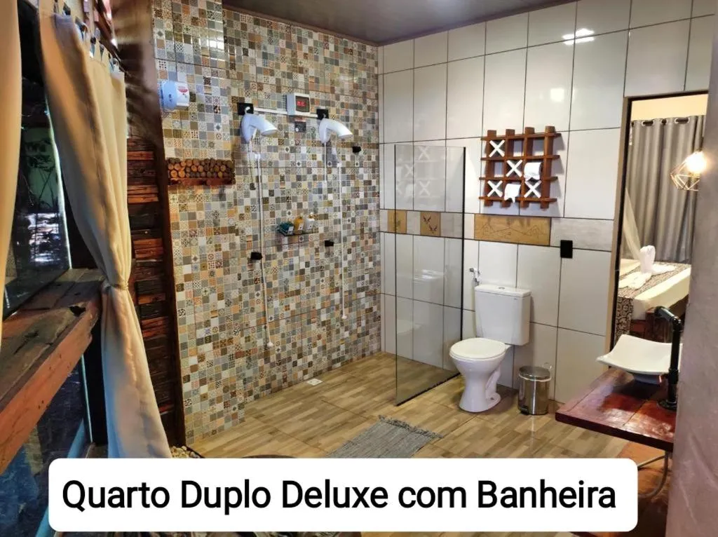 Bathroom in Sanctuary Pirenópolis Suítes e Flats