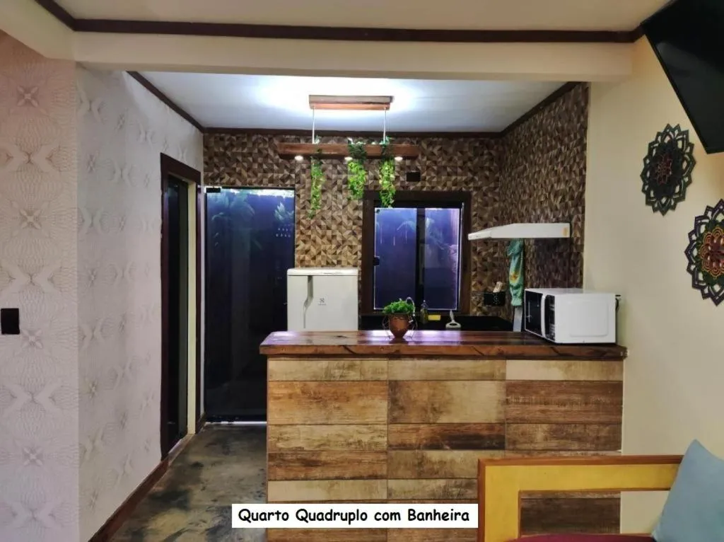 Kitchen or kitchenette in Sanctuary Pirenópolis Suítes e Flats