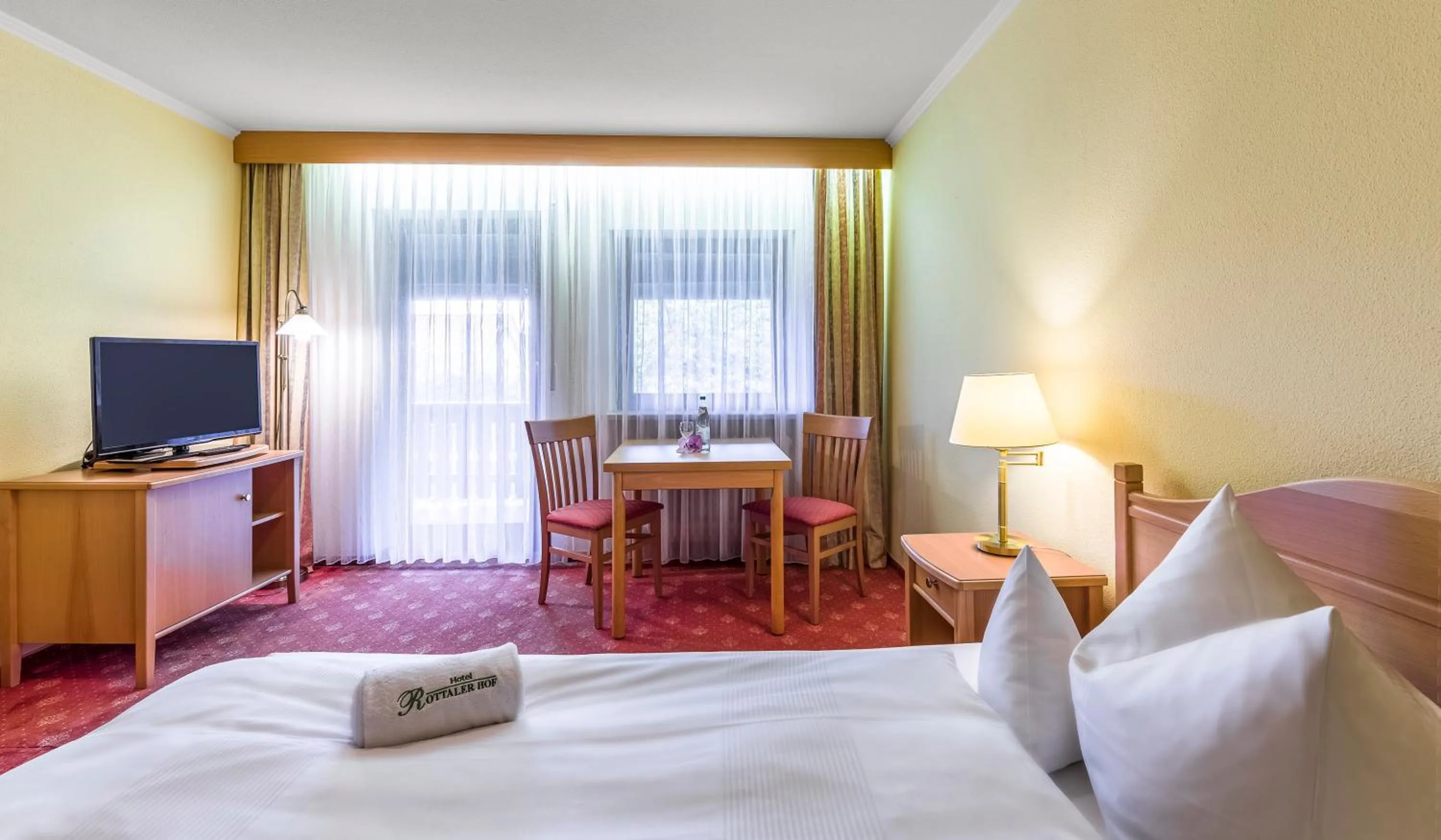 Photo of the whole room, Bed in Hotel Rottaler Hof