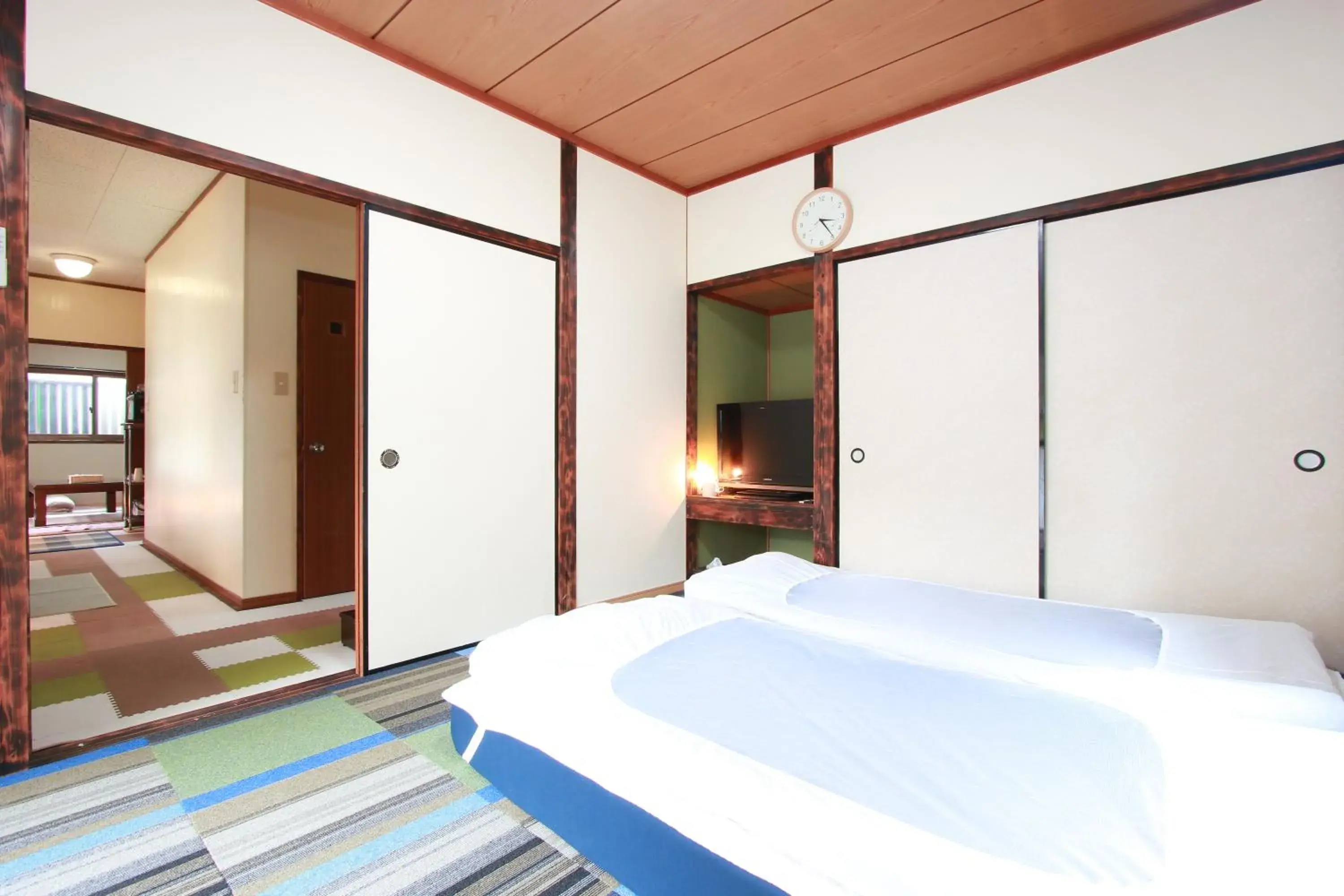 Bed in Ramune Onsen Senju no Sato Bed in Ramune Onsen Senju no Sato