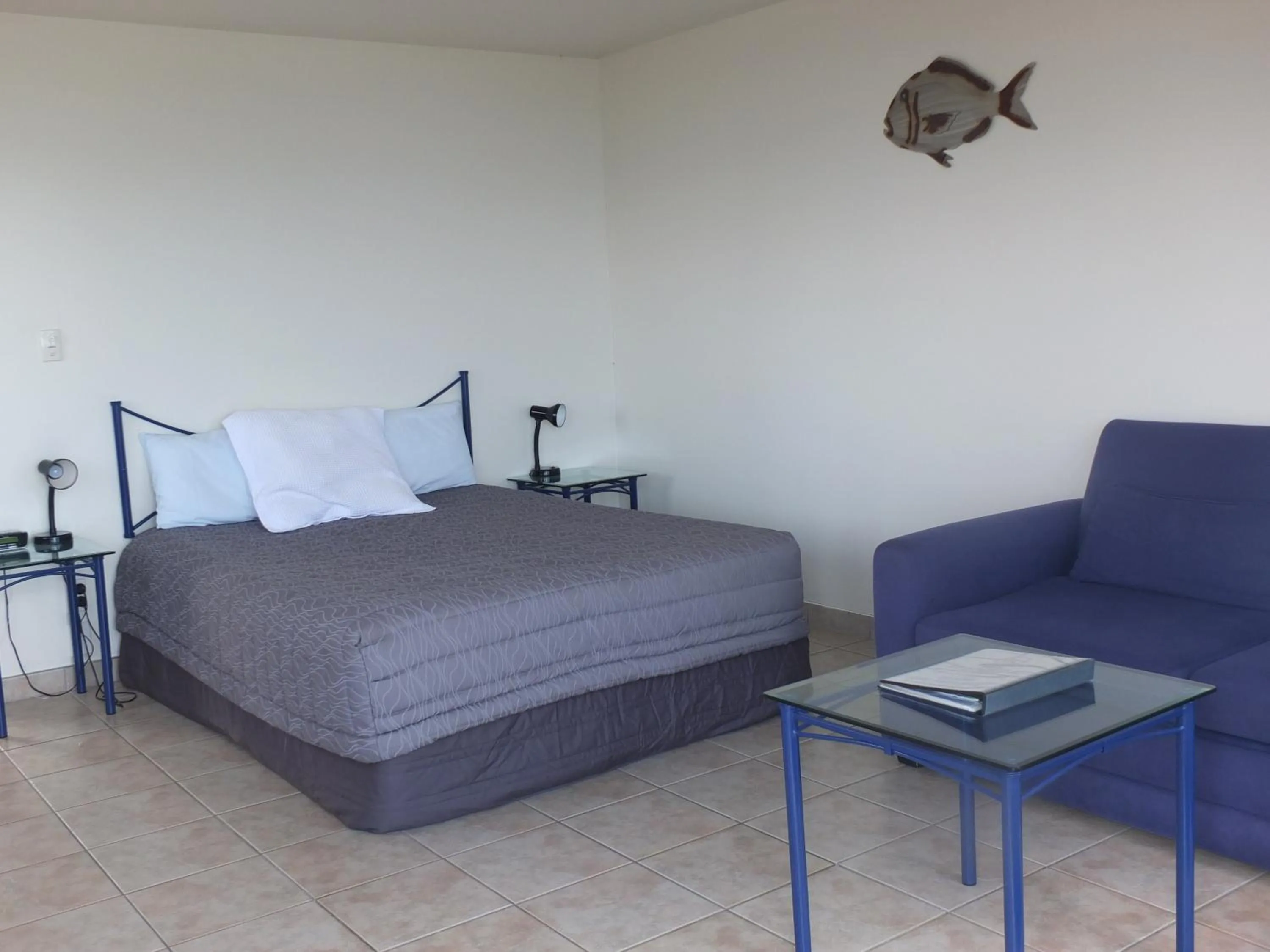 Bed in Ahipara Bay Motel