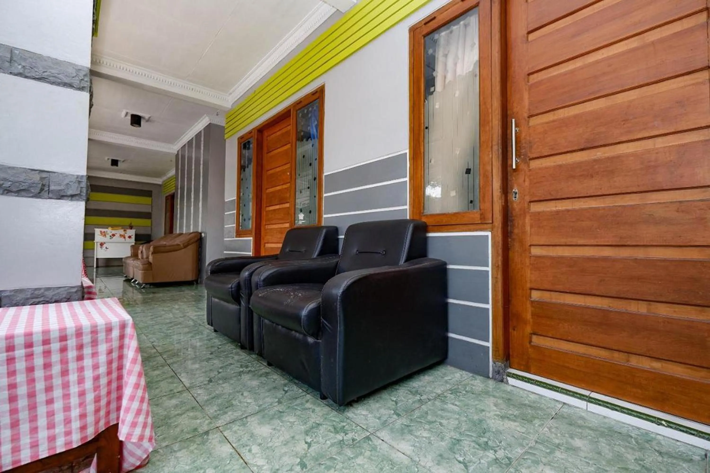 Communal lounge/ TV room in Griya Sakura Syariah near UMS
