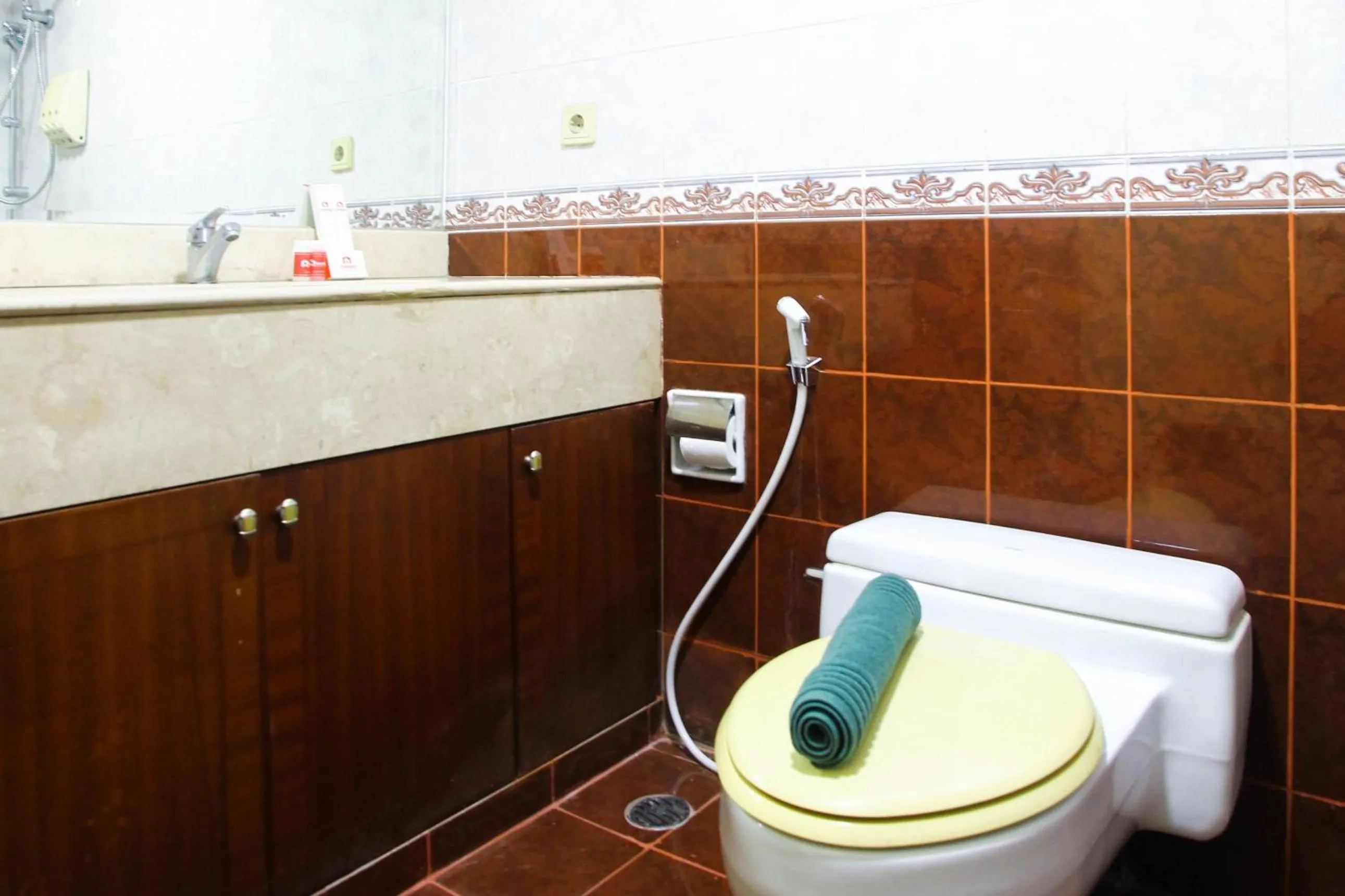 Bathroom in 2BR Family Sudirman Tower Condominium Apartment near Plaza Semanggi By Travelio