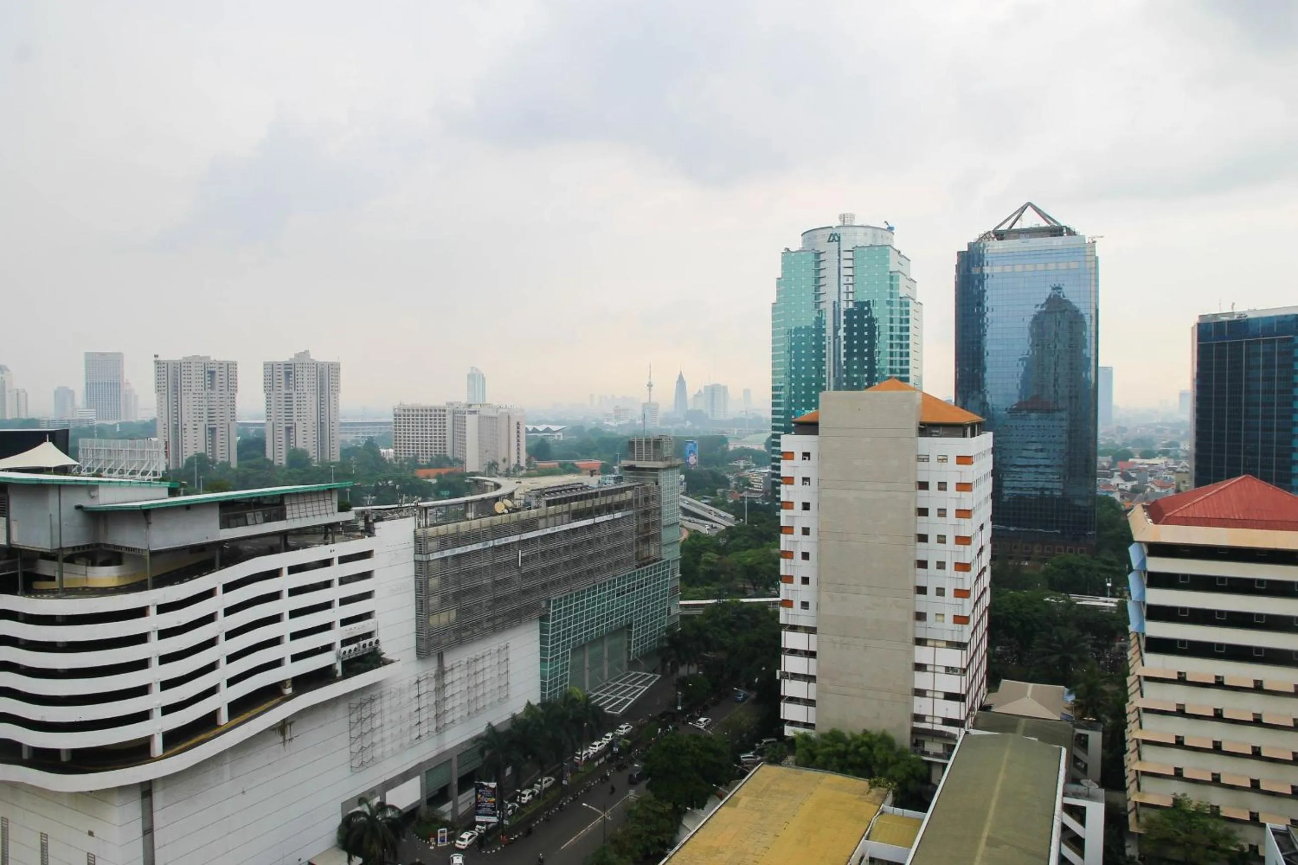 Property building in 2BR Family Sudirman Tower Condominium Apartment near Plaza Semanggi By Travelio
