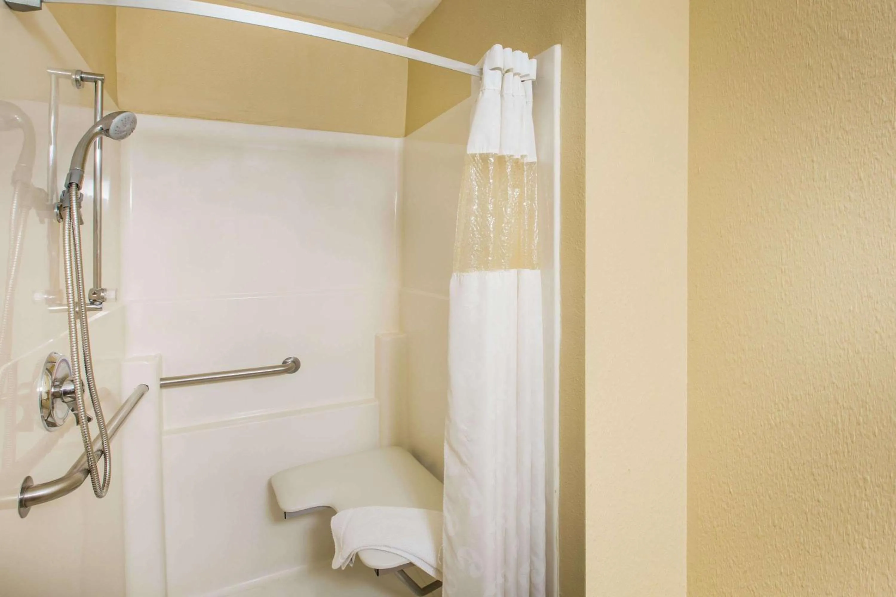 Bathroom in Ramada by Wyndham Sioux Falls