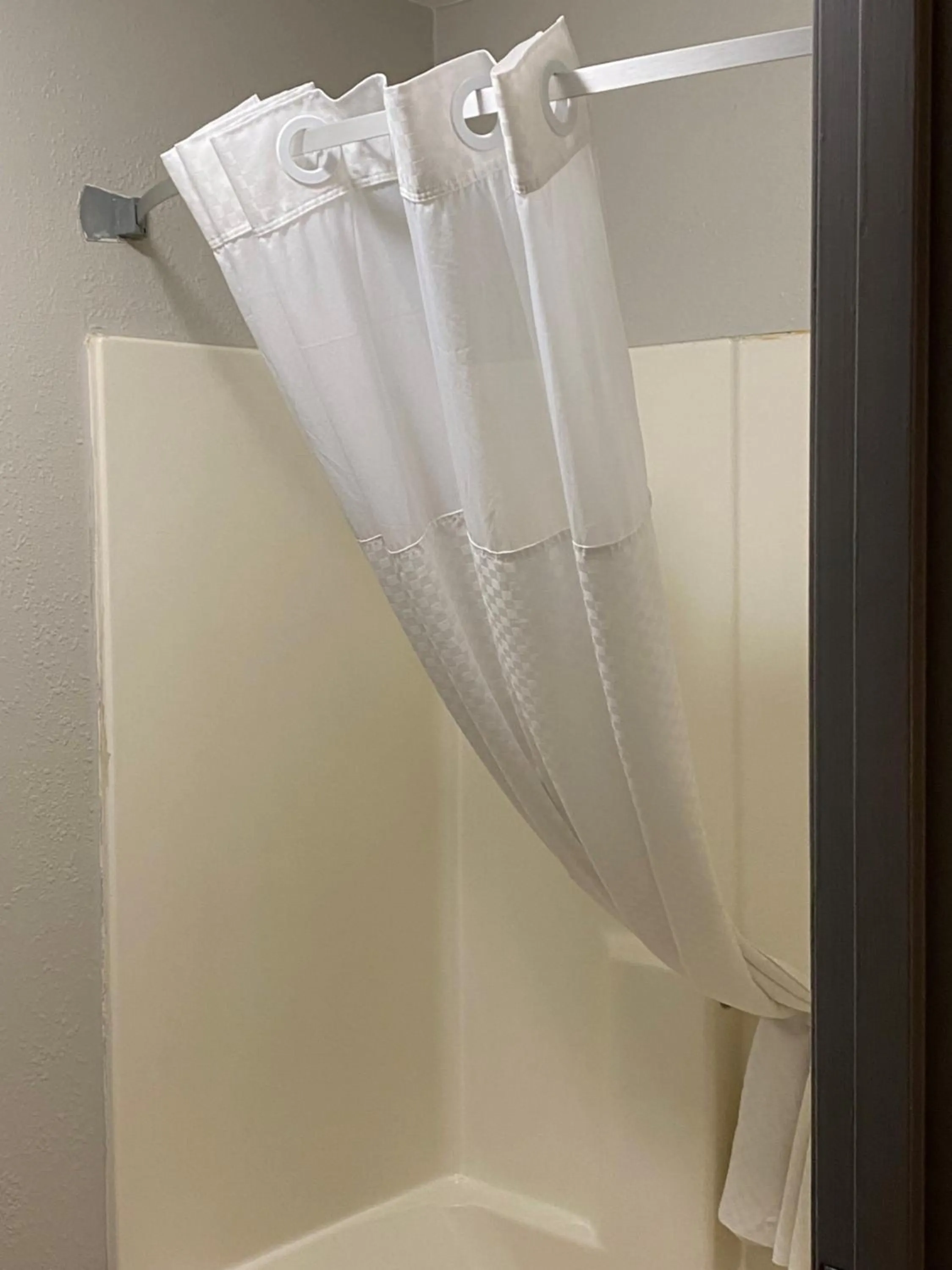 Bathroom in Ramada by Wyndham Sioux Falls