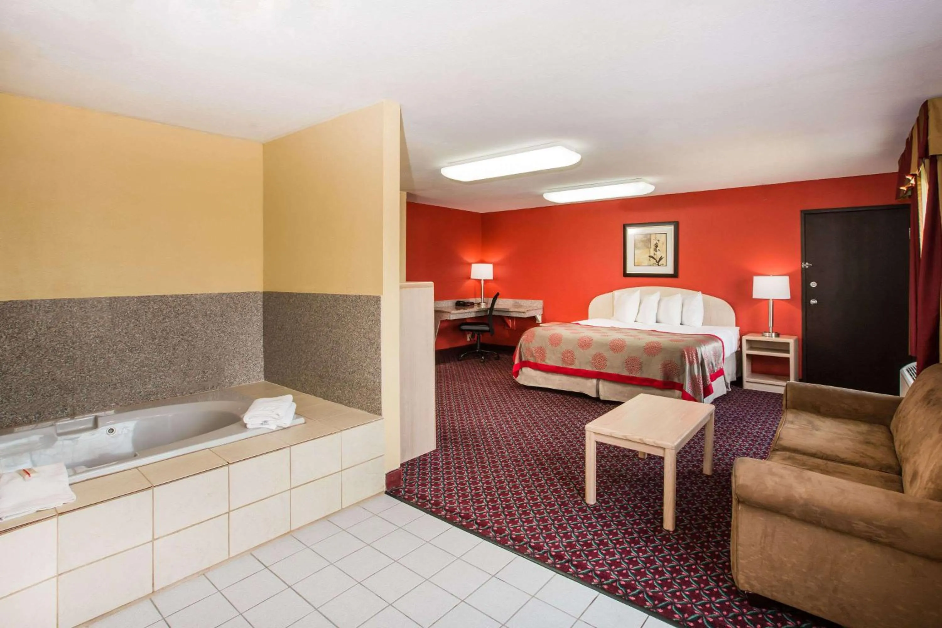 Photo of the whole room, Bed in Ramada by Wyndham Sioux Falls
