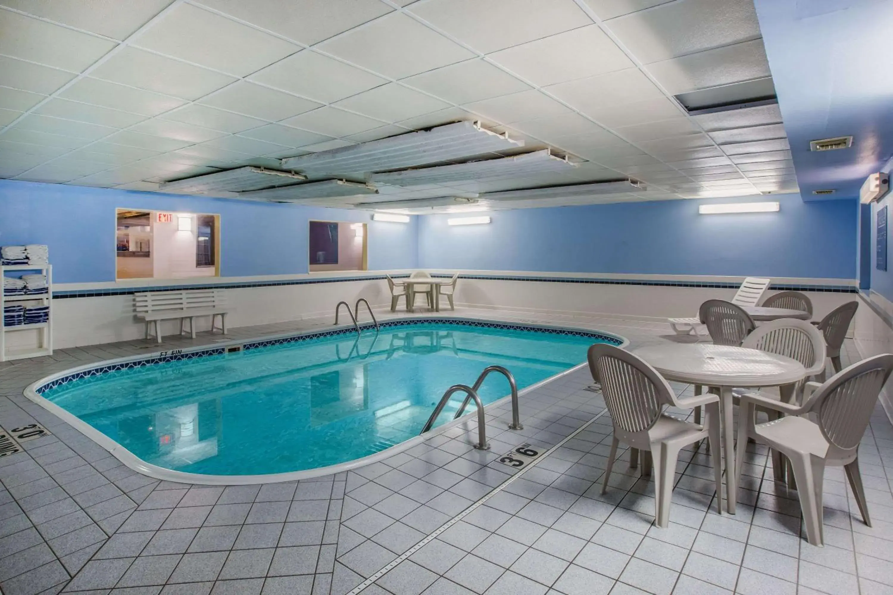 On site, Swimming Pool in Ramada by Wyndham Sioux Falls