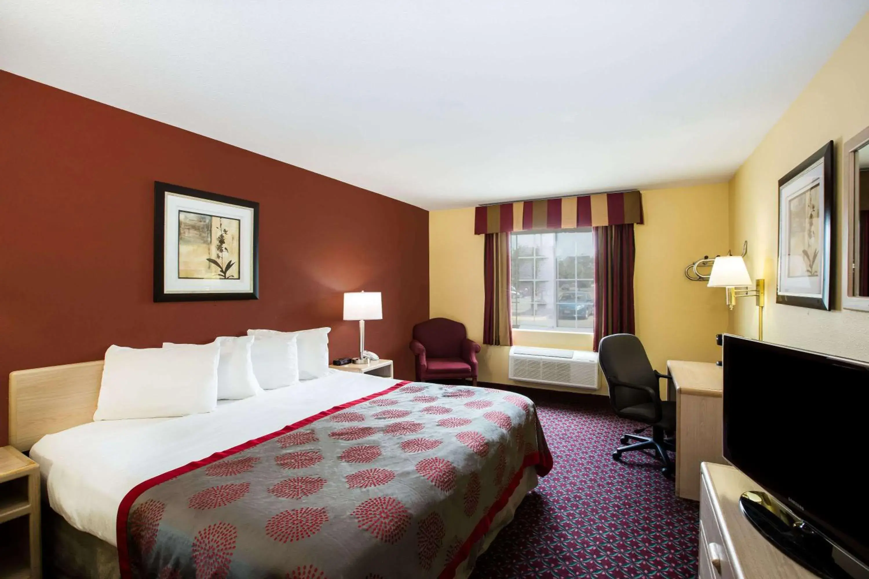 Photo of the whole room, Bed in Ramada by Wyndham Sioux Falls