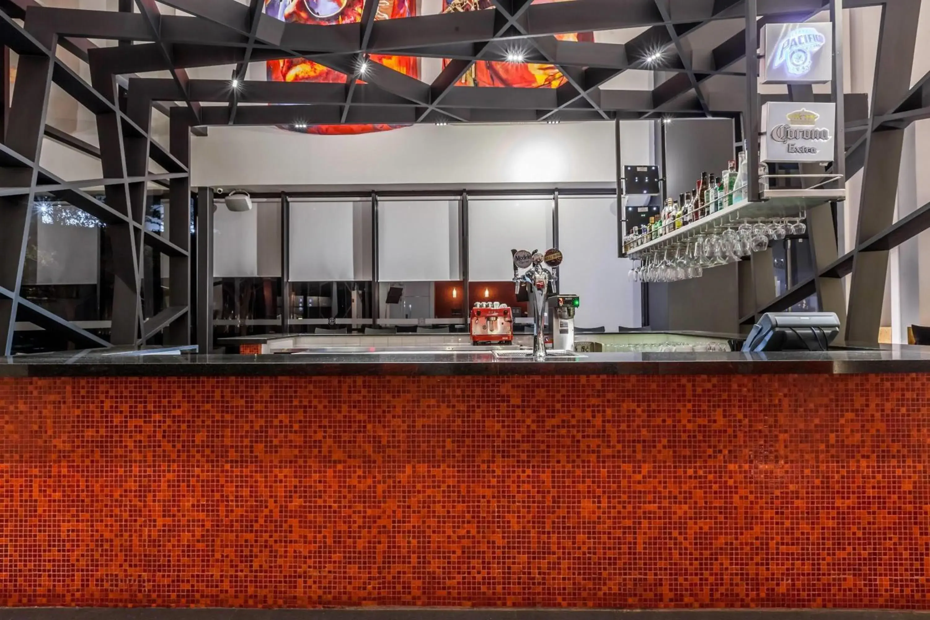 Lounge or bar in Ramada Encore by Wyndham Guadalajara Sur Lounge or bar in Ramada Encore by Wyndham Guadalajara Sur