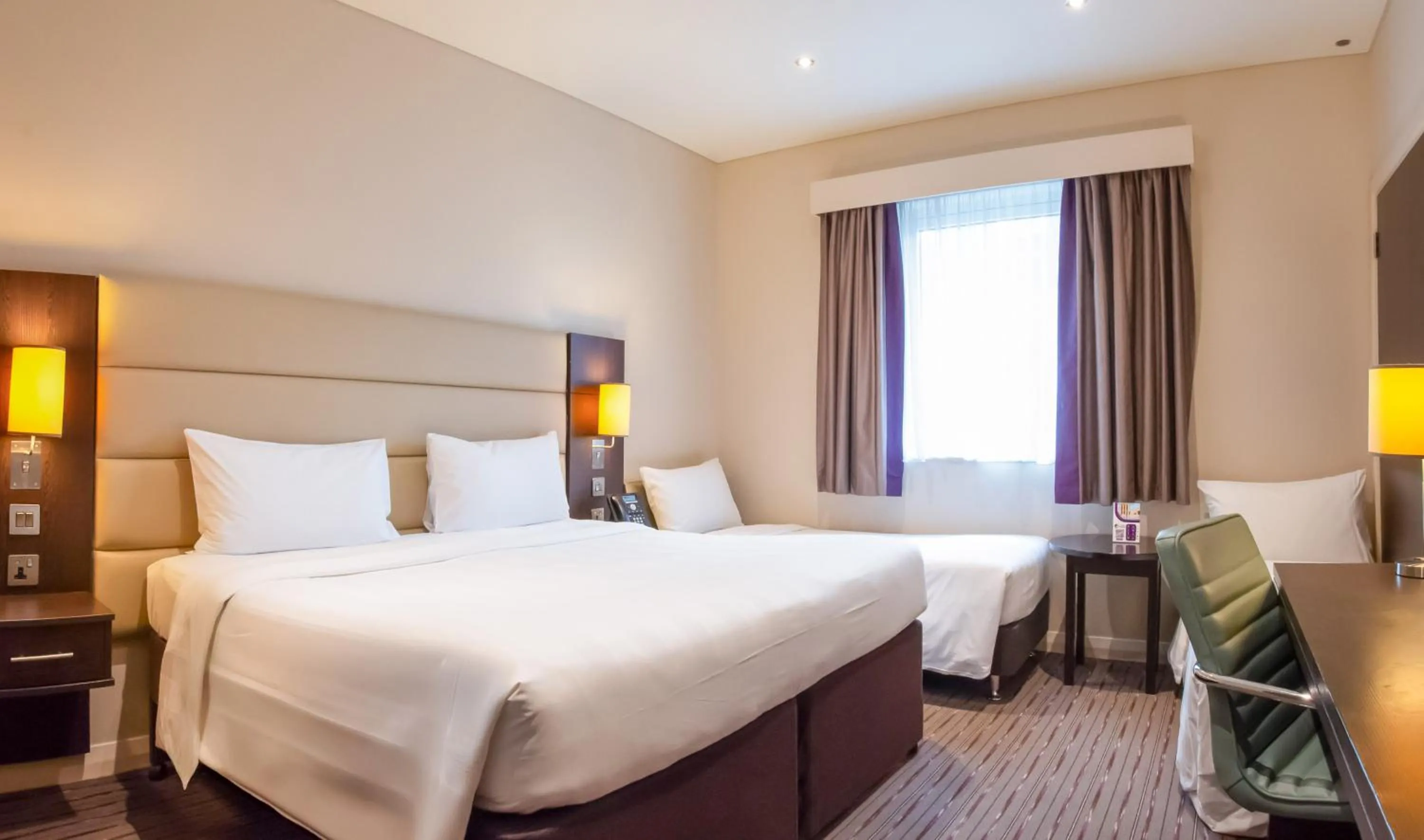 Bed in Premier Inn Doha Airport