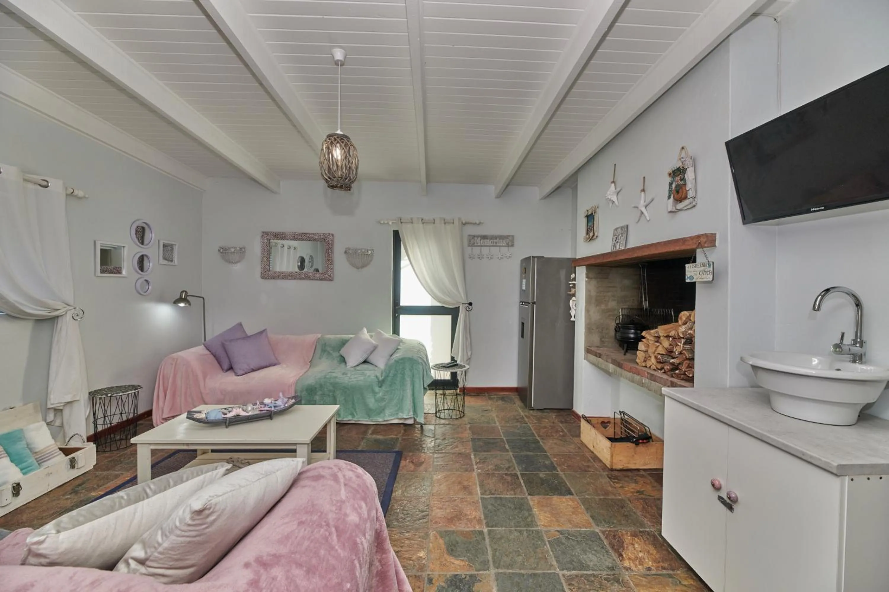 Communal lounge/ TV room in Fraai Uitzicht Struisbaai