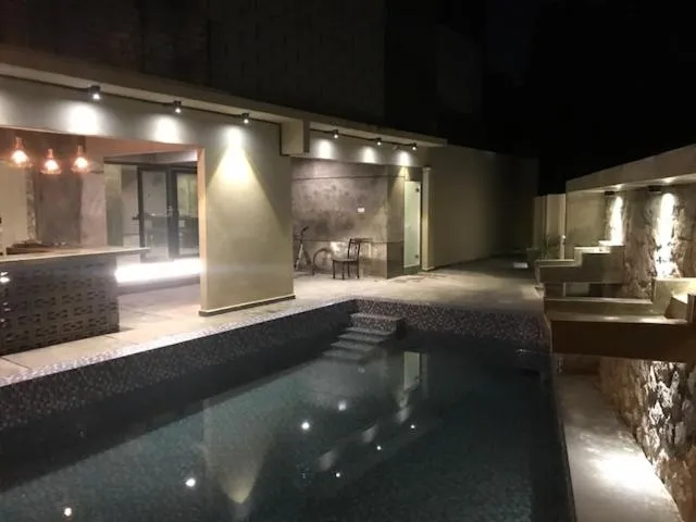 Swimming pool in LE LODGE MANSION