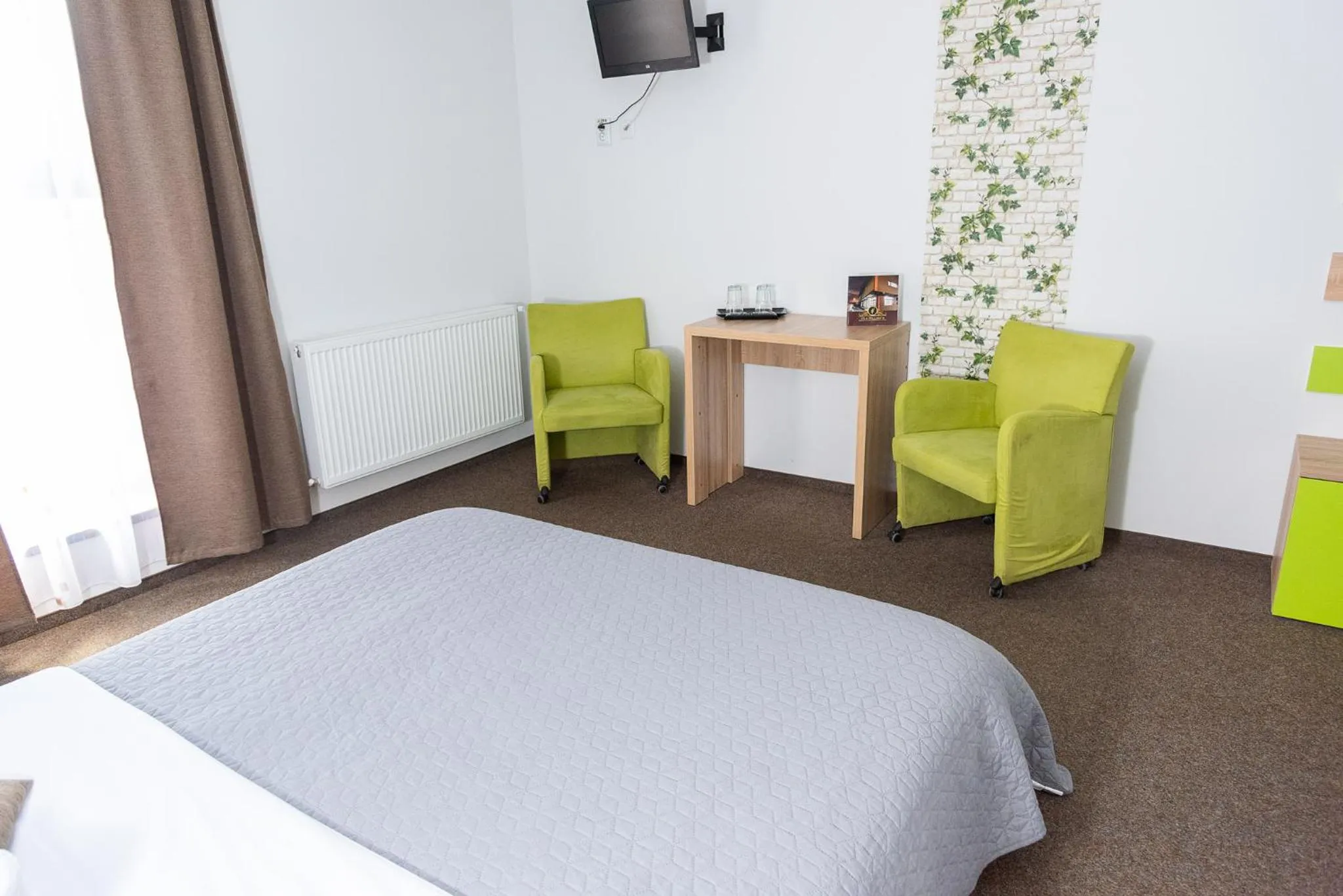 Seating area, Bed in Vila William’s