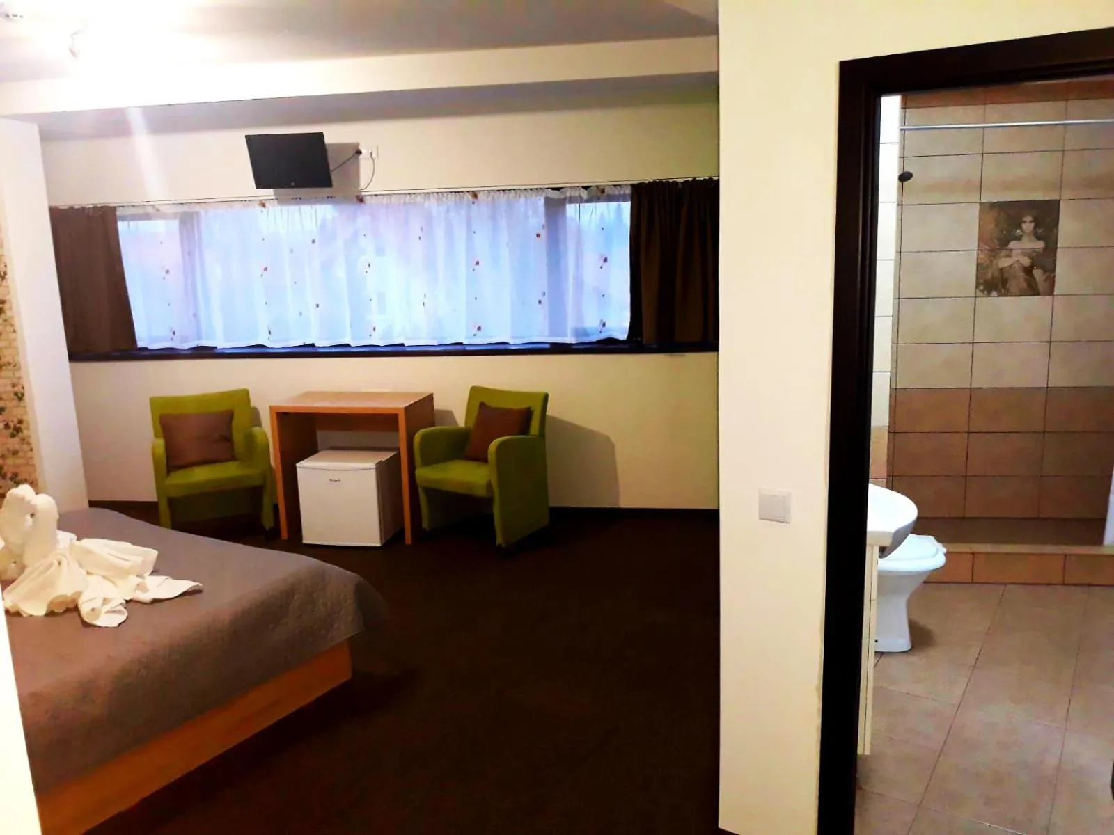 Seating area, Bed in Vila William’s