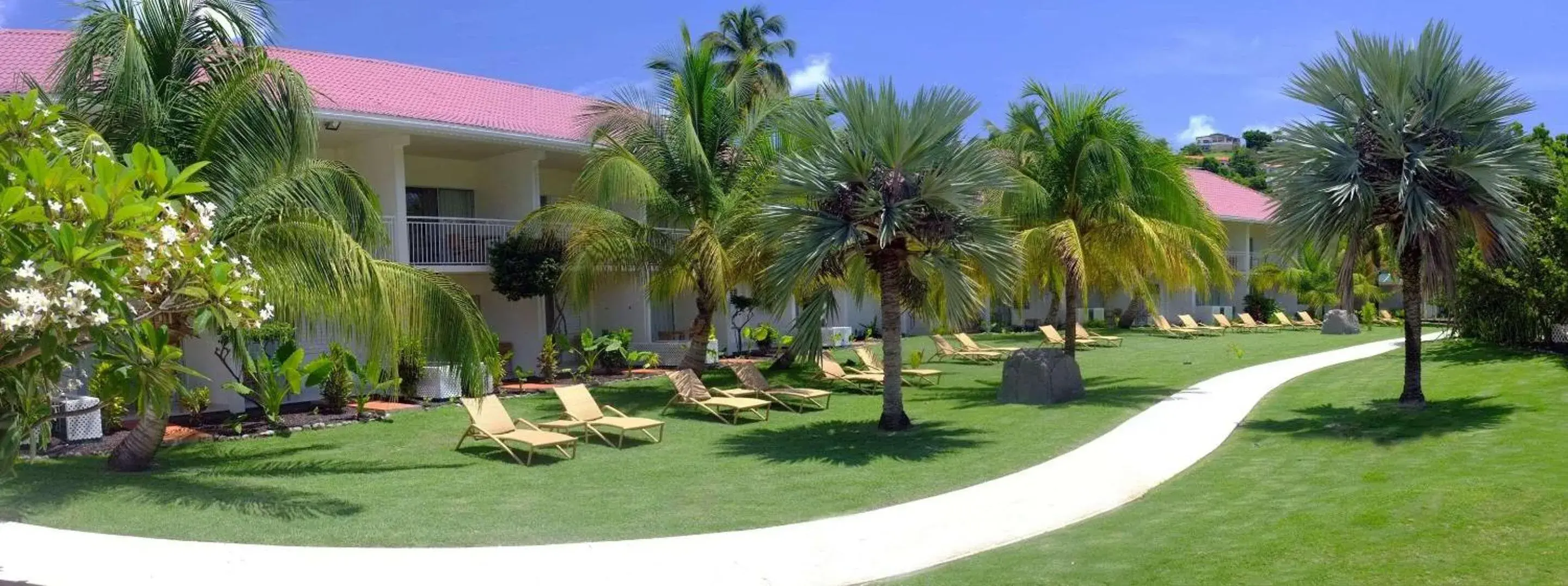 Property building in Radisson Grenada Beach Resort Property building in Radisson Grenada Beach Resort