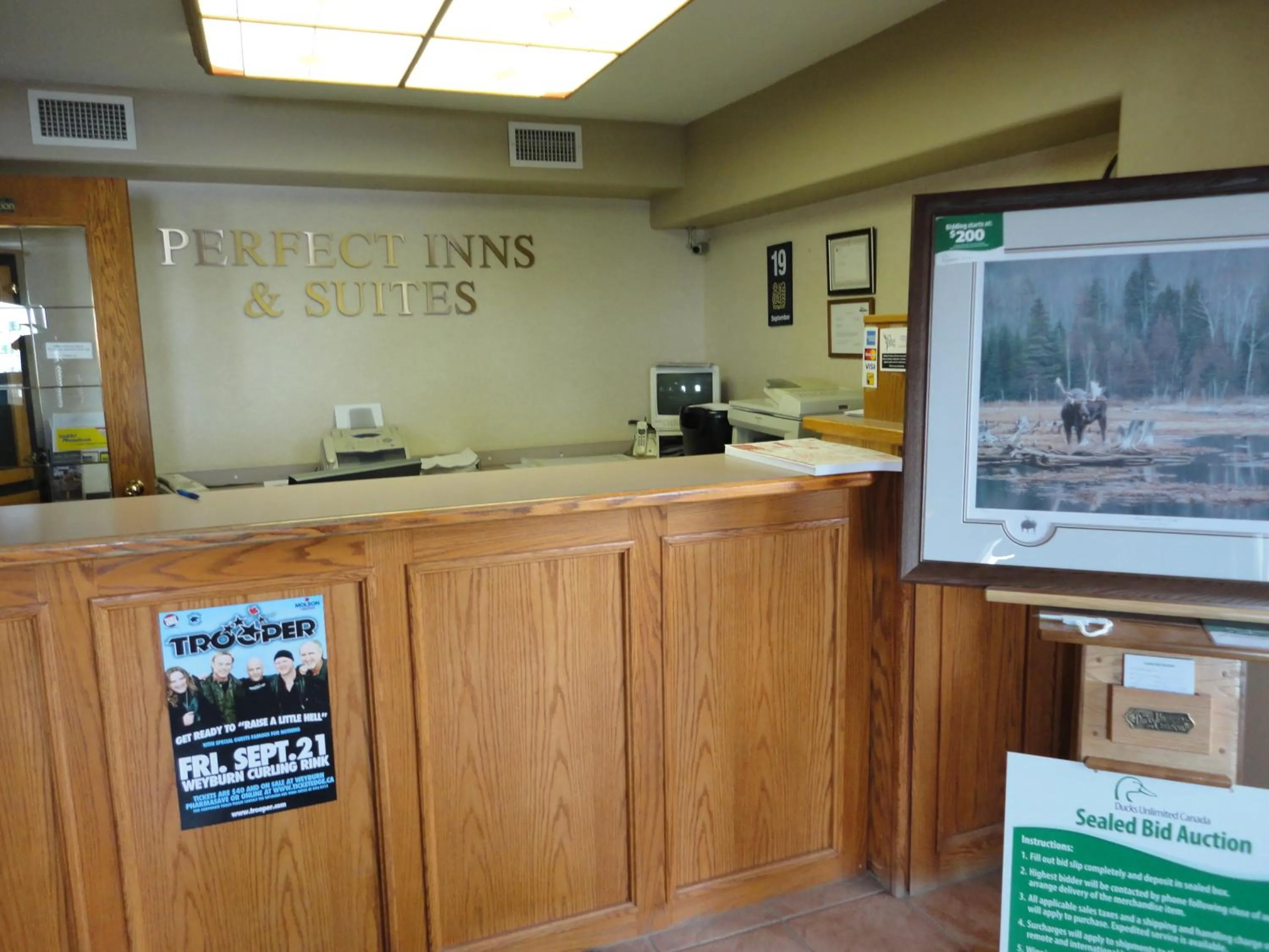 Lobby or reception in Perfect Inns & Suites