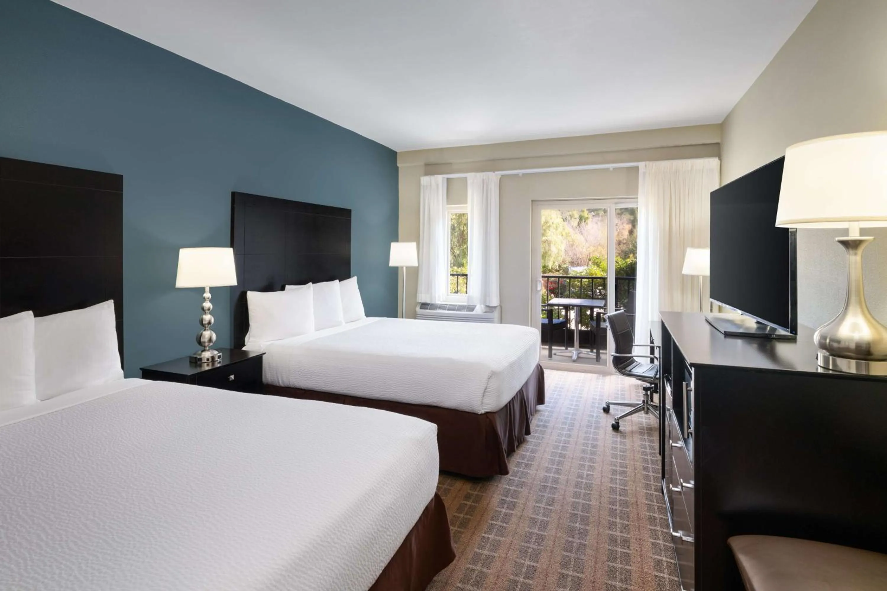 Bedroom, Bed in La Cuesta Inn, BW Signature Collection