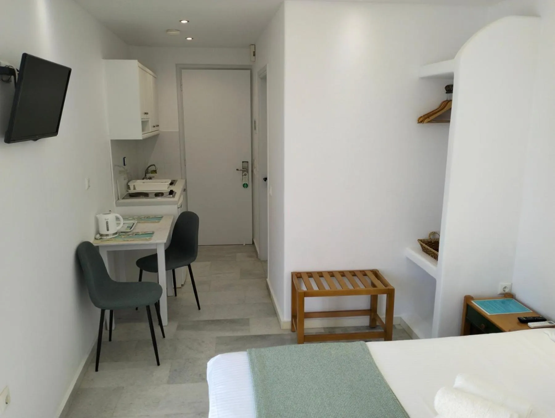 Bed in Nostos Studios at Saint George beach Agios Georgios Chora Naxos town