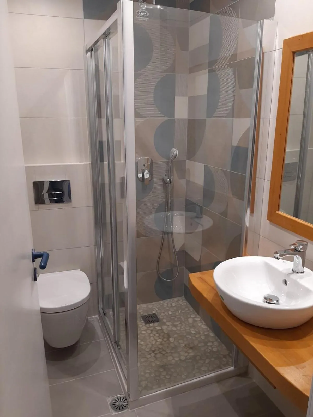 Shower in Nostos Studios at Saint George beach Agios Georgios Chora Naxos town