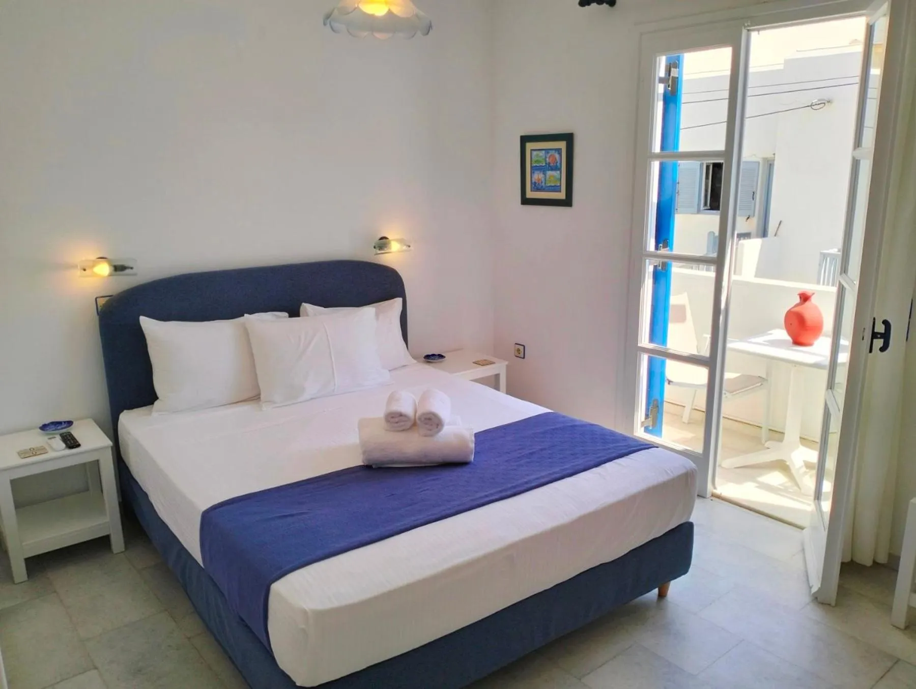 Bedroom, Bed in Nostos Studios at Saint George beach Agios Georgios Chora Naxos town