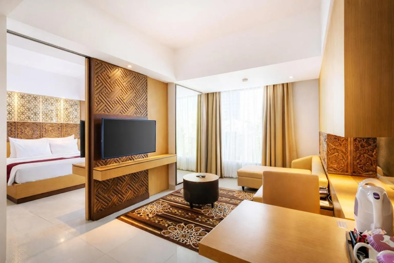 Living room, Bed in Horison Ultima Seminyak Bali - CHSE Certified