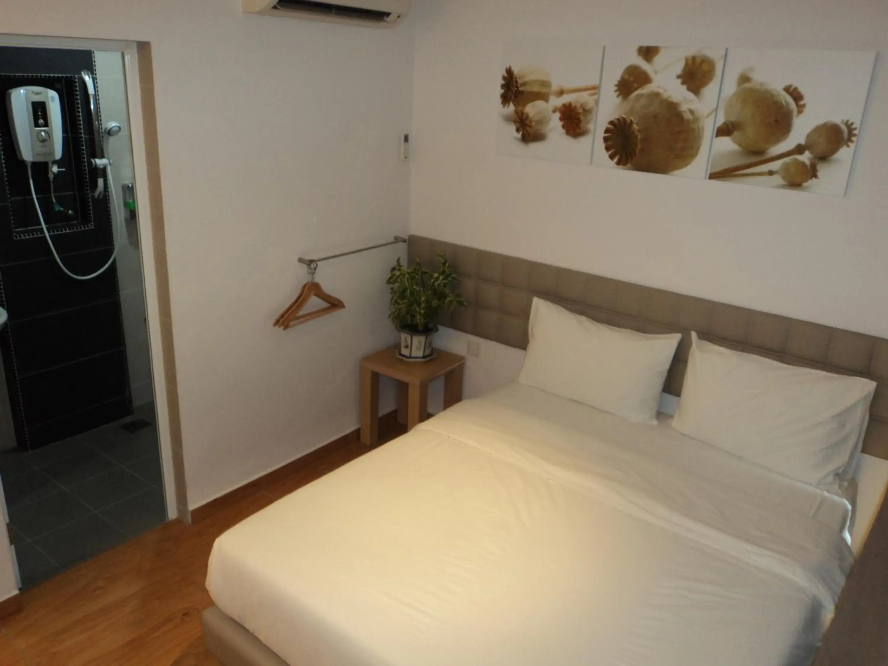 Bed in GM City Hotel Bed in GM City Hotel