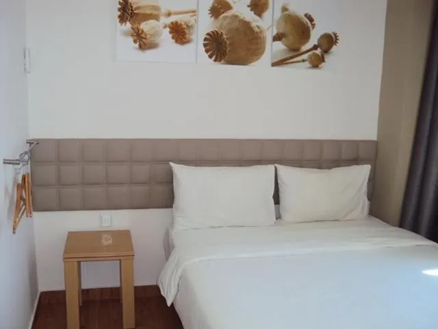 Bed in GM City Hotel