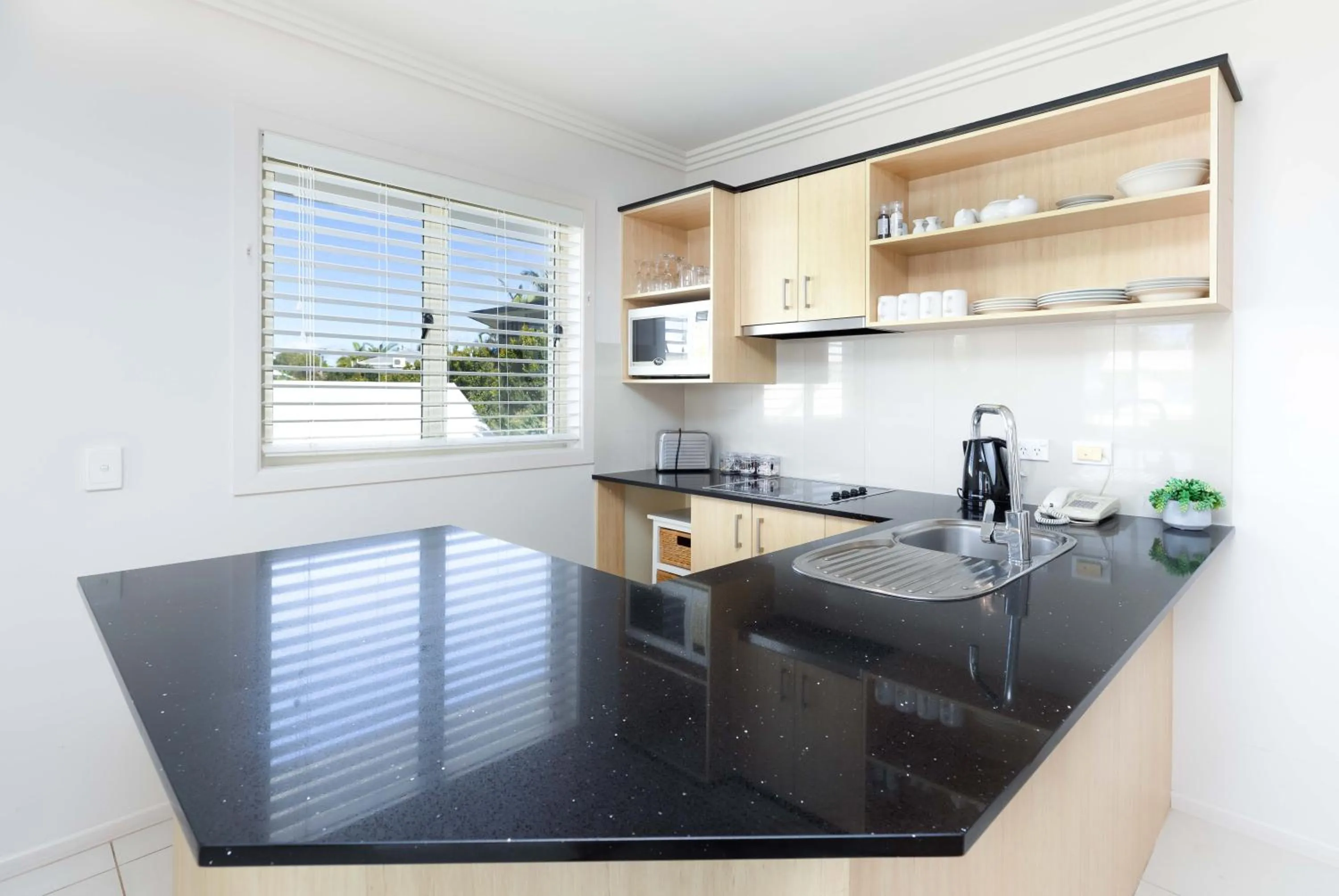 Kitchen or kitchenette in Noosa River Palms