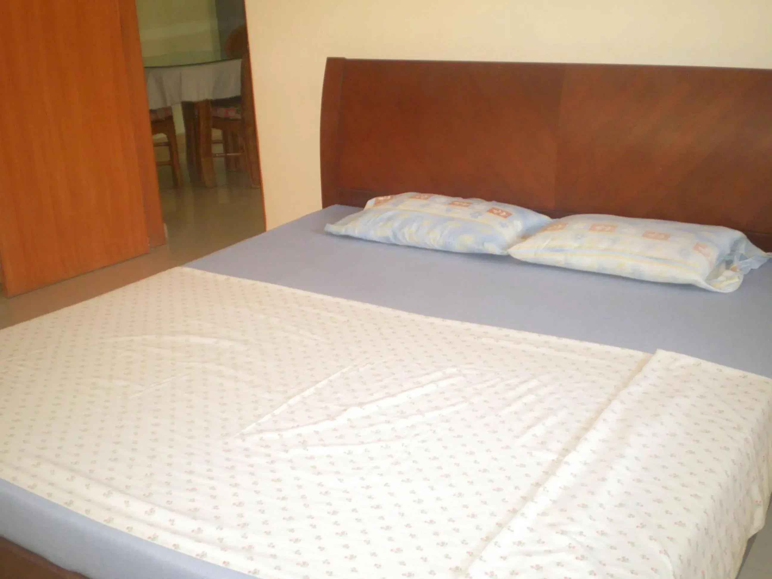 Bed in Dumaguete Springs Apartment