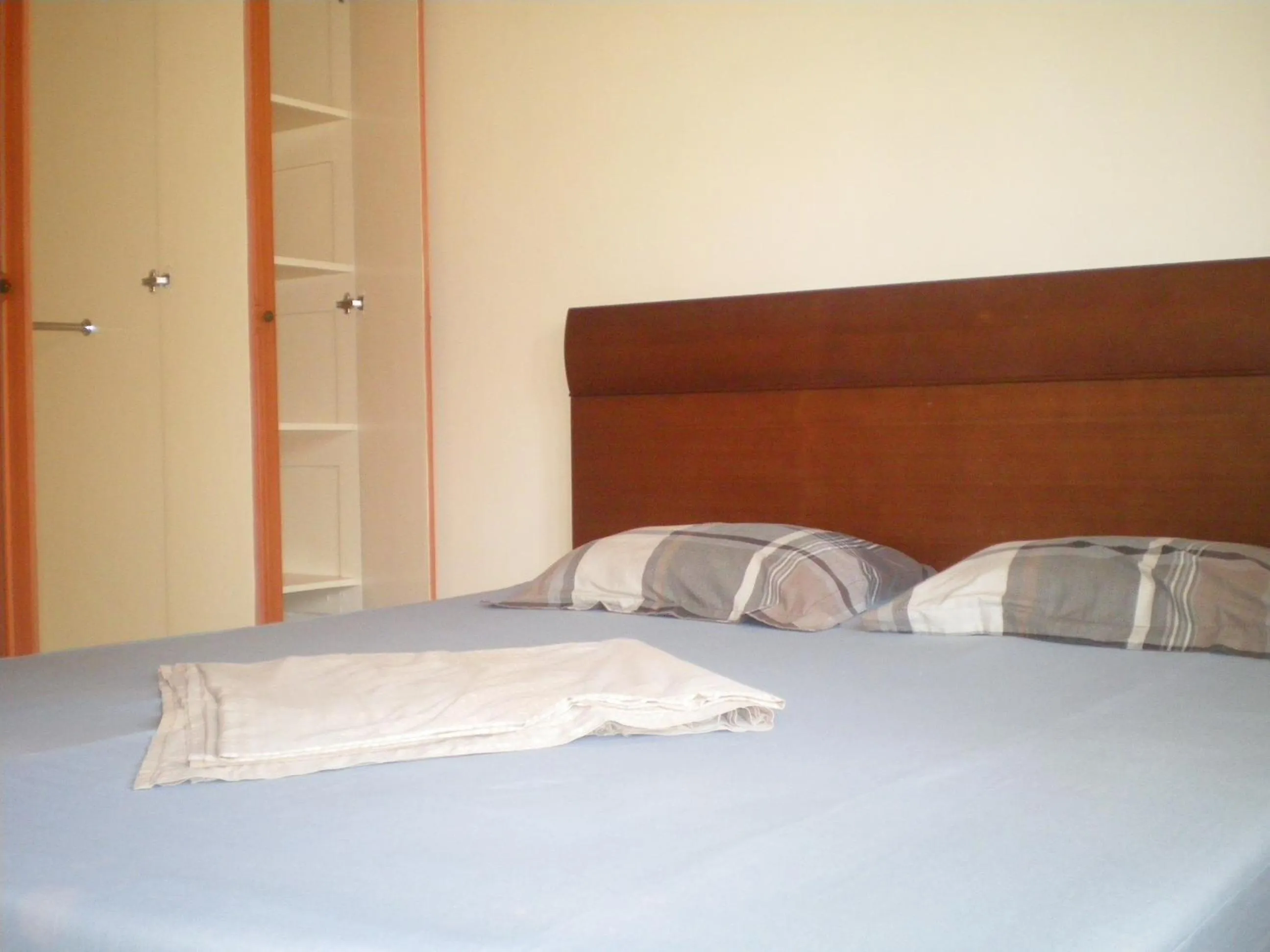 Bed in Dumaguete Springs Apartment