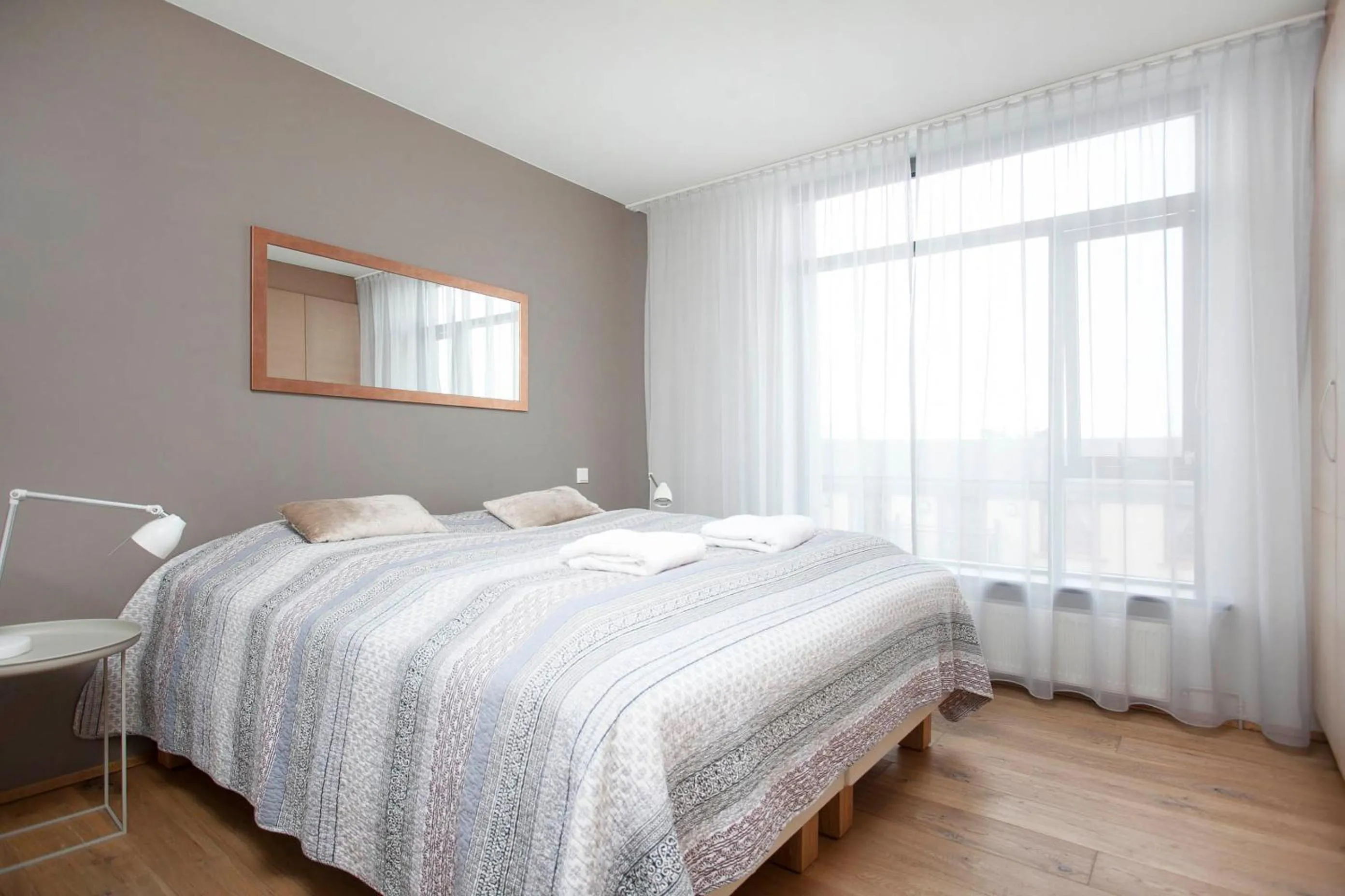 Bedroom, Bed in Planet Apartments