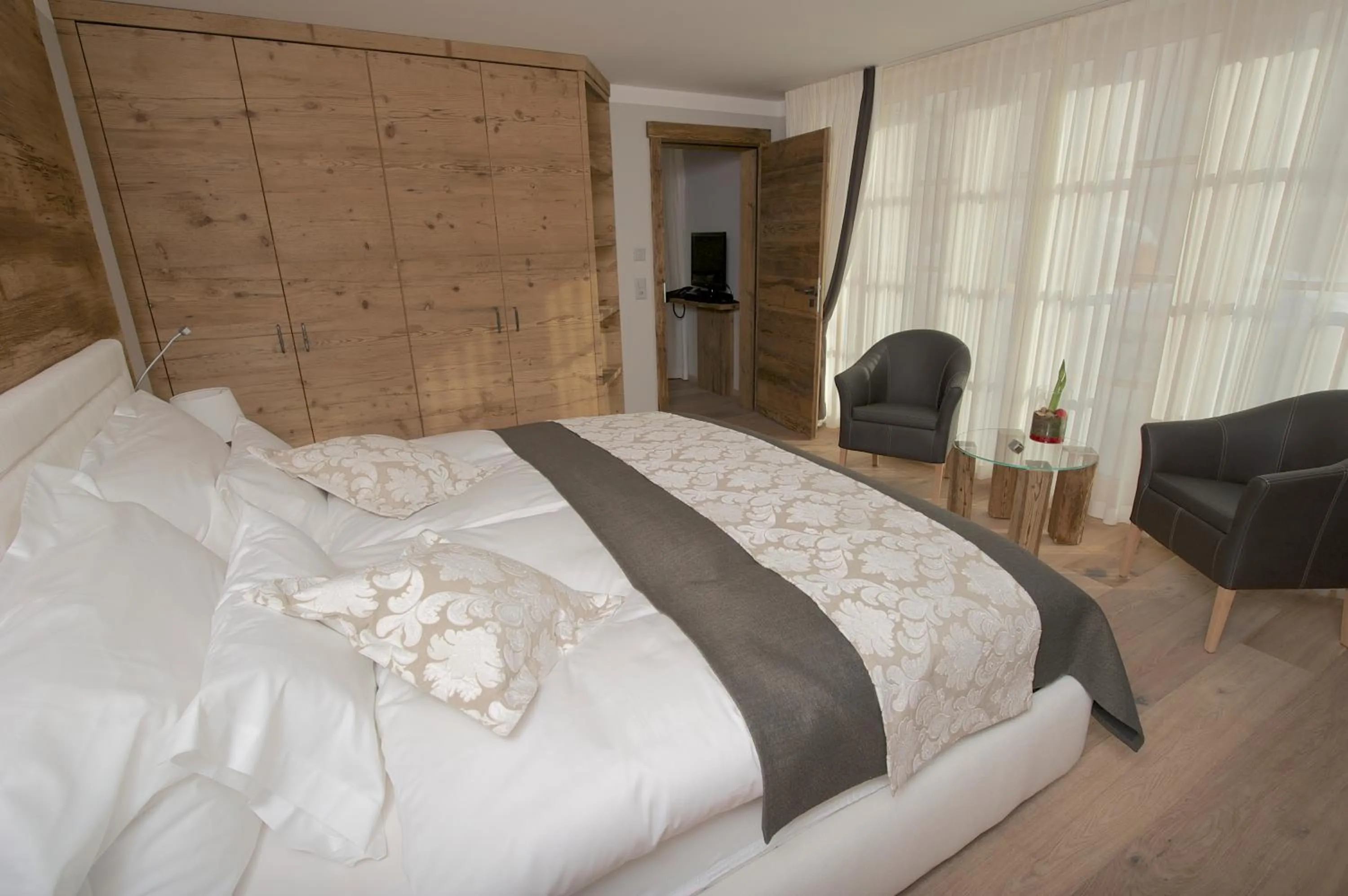 Bedroom, Bed in Hotelino Petit Chalet