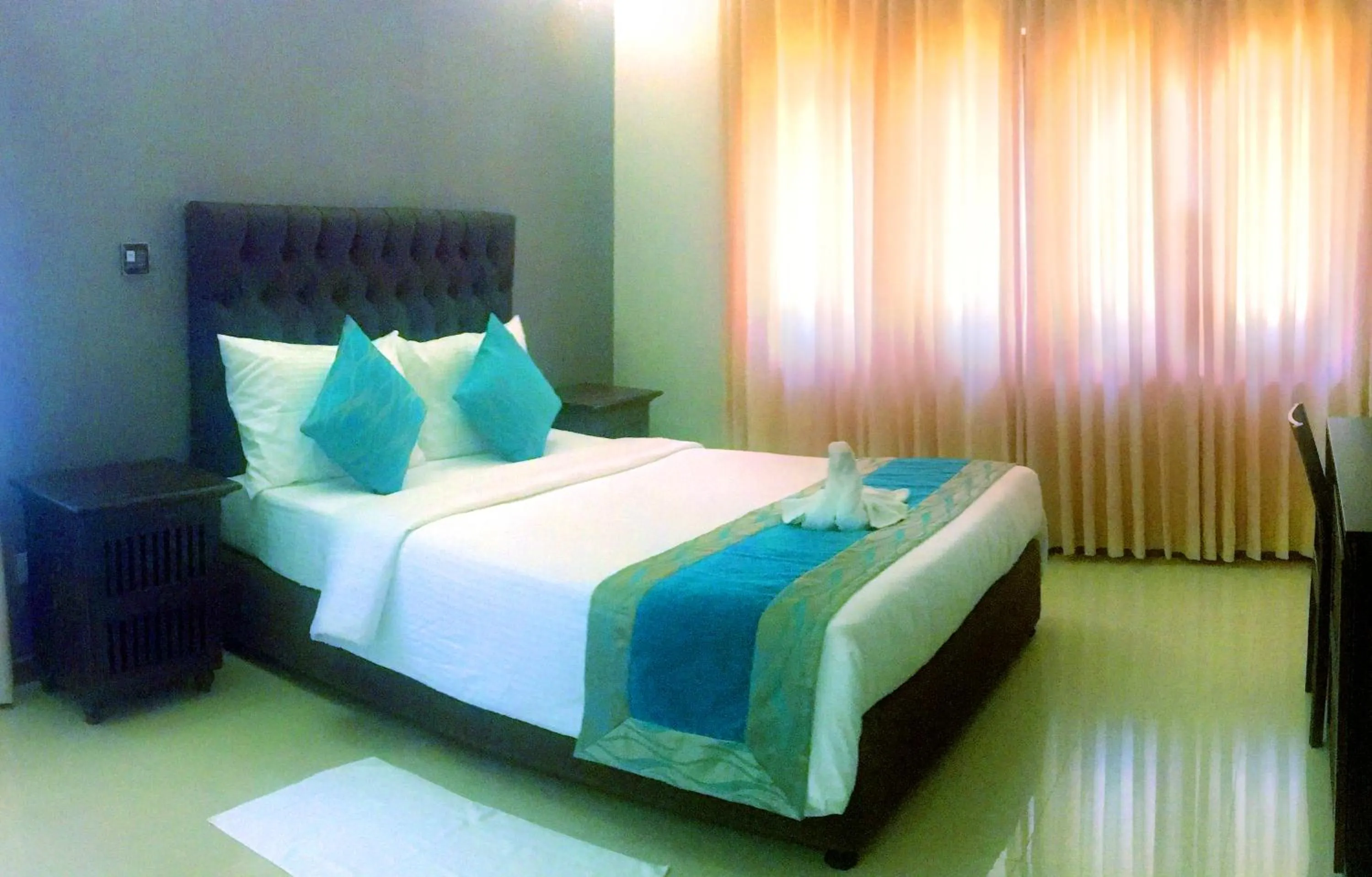 Photo of the whole room, Bed in Forever City Hotel