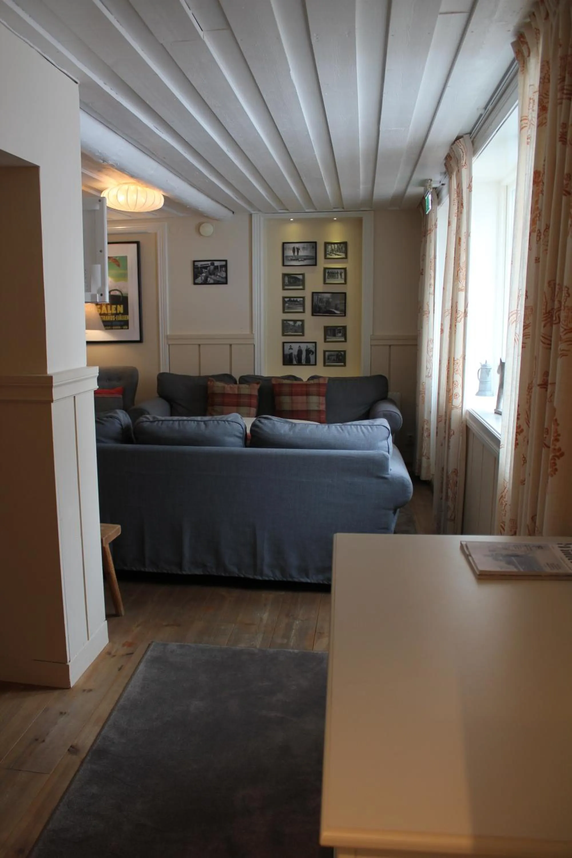 Living room, Bed in Olarsgården Hotell