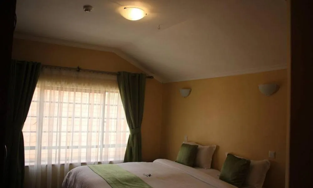 Bedroom, Bed in LIA Hotel & Training Centre