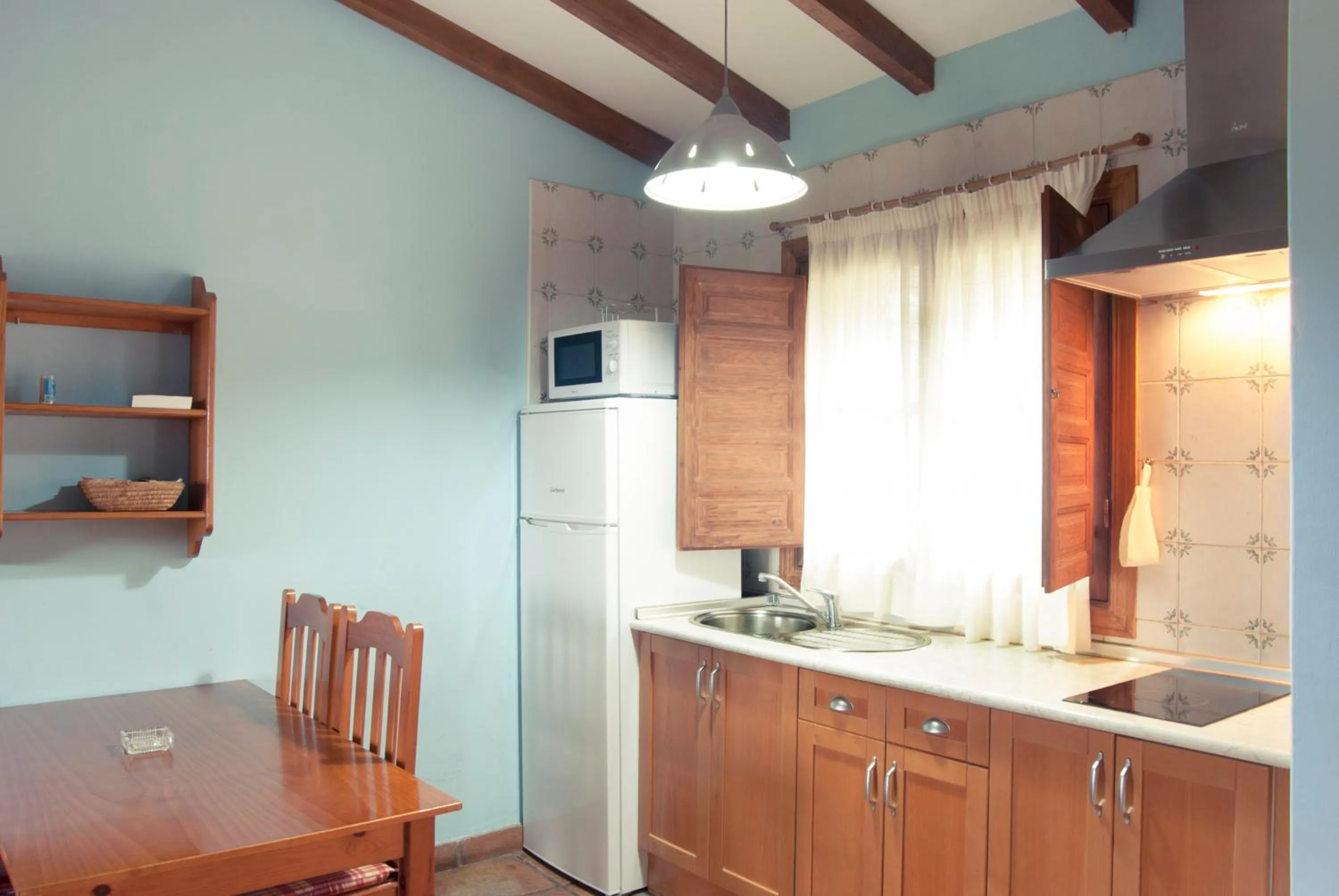 Kitchen or kitchenette in Apartamentos El Calambuco