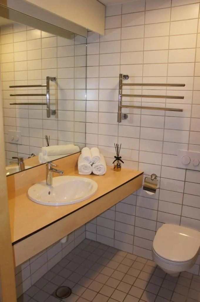 Bathroom in Zaliasis slenis - Self check-in hotel - Free parking