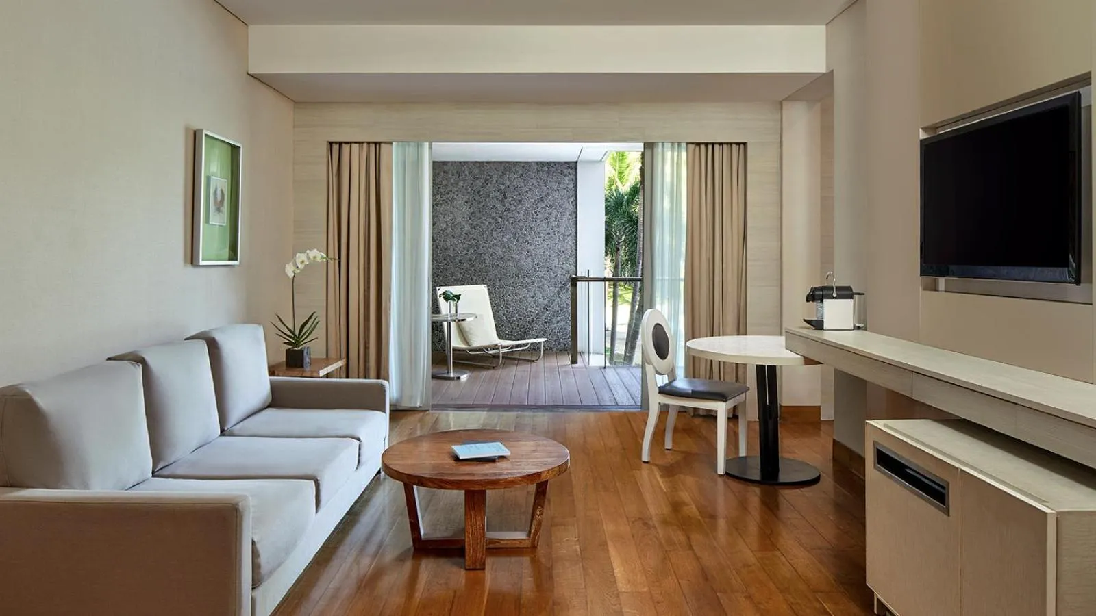 Living room in The Stones Hotel - Legian Bali