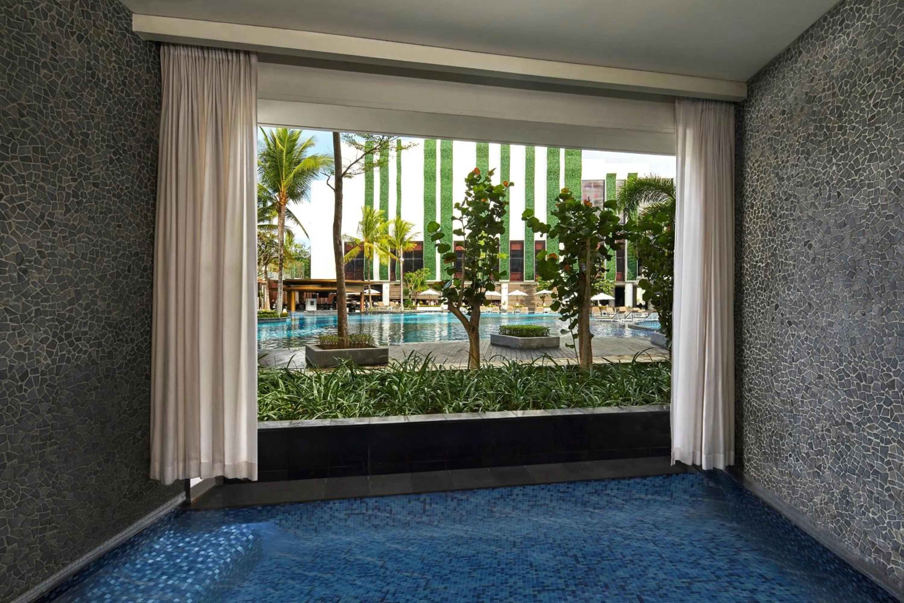 Swimming pool in The Stones Hotel - Legian Bali