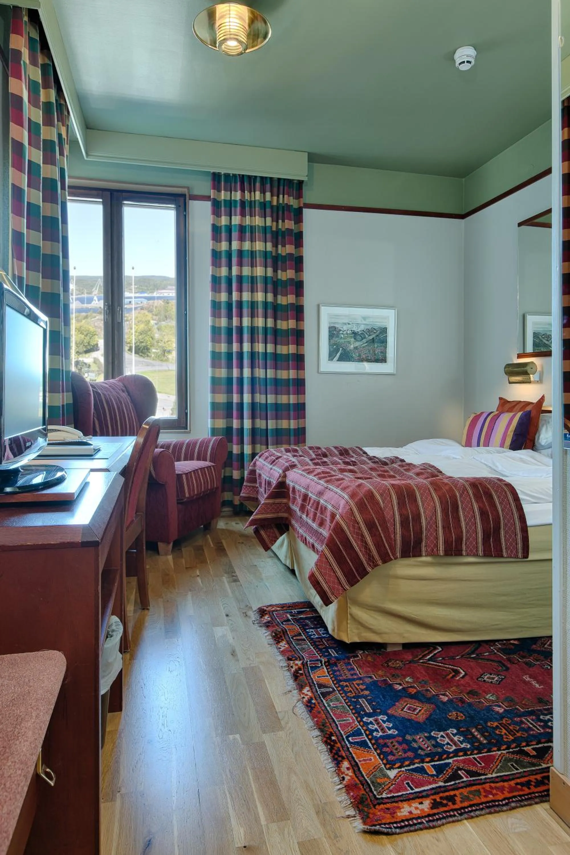 Photo of the whole room, Bed in Bohusgården Hotell & Konferens