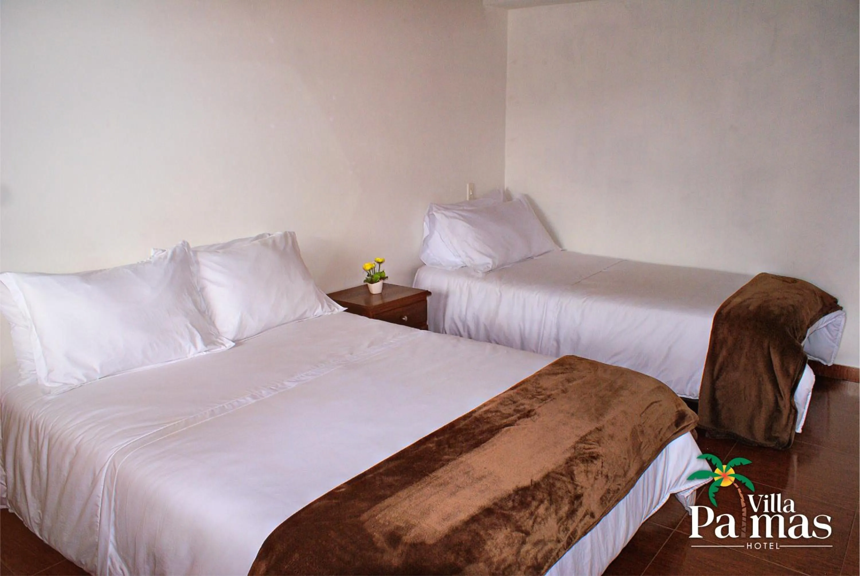 Bed in Hotel Villa Palmas