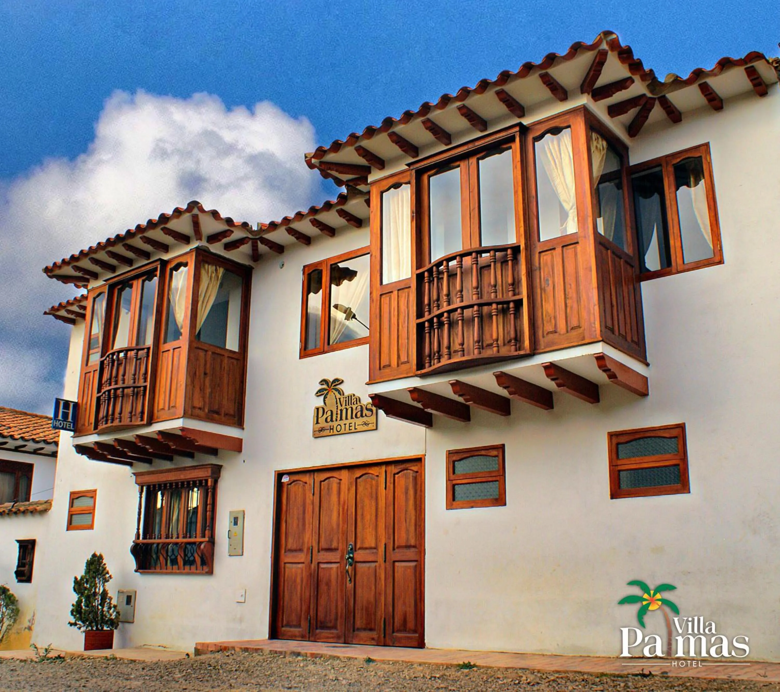 Property building in Hotel Villa Palmas