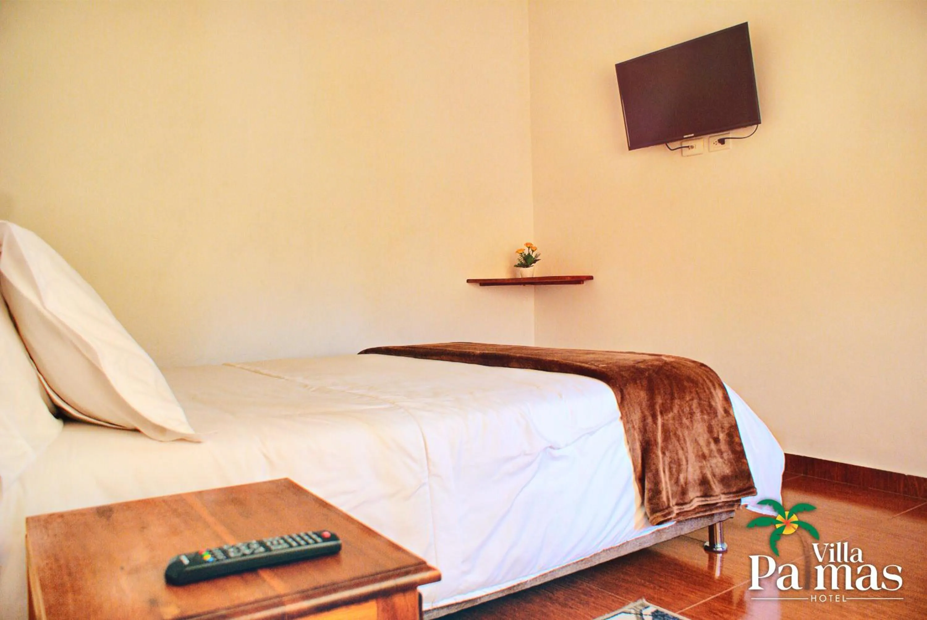 Bed in Hotel Villa Palmas