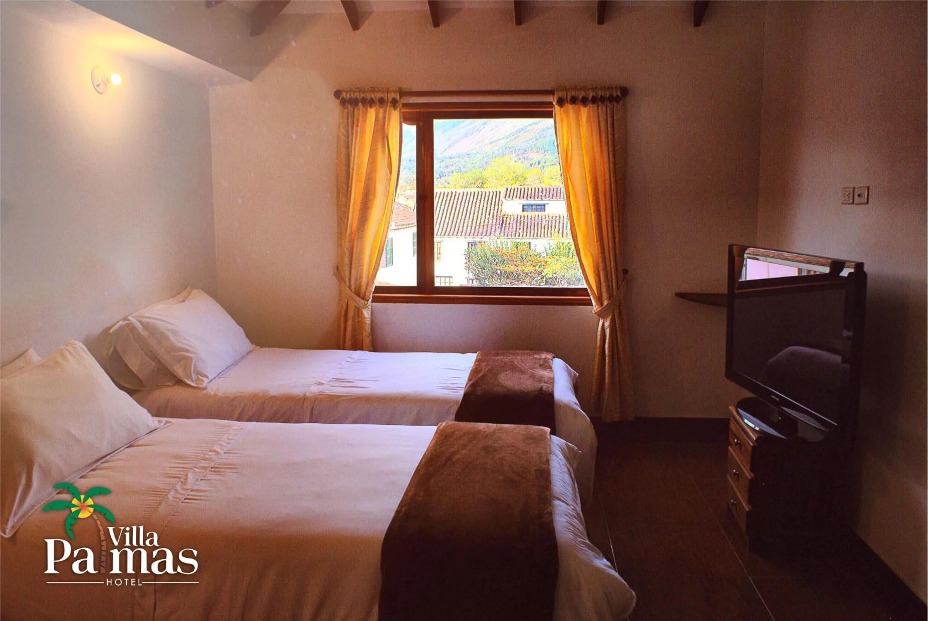 Bed in Hotel Villa Palmas