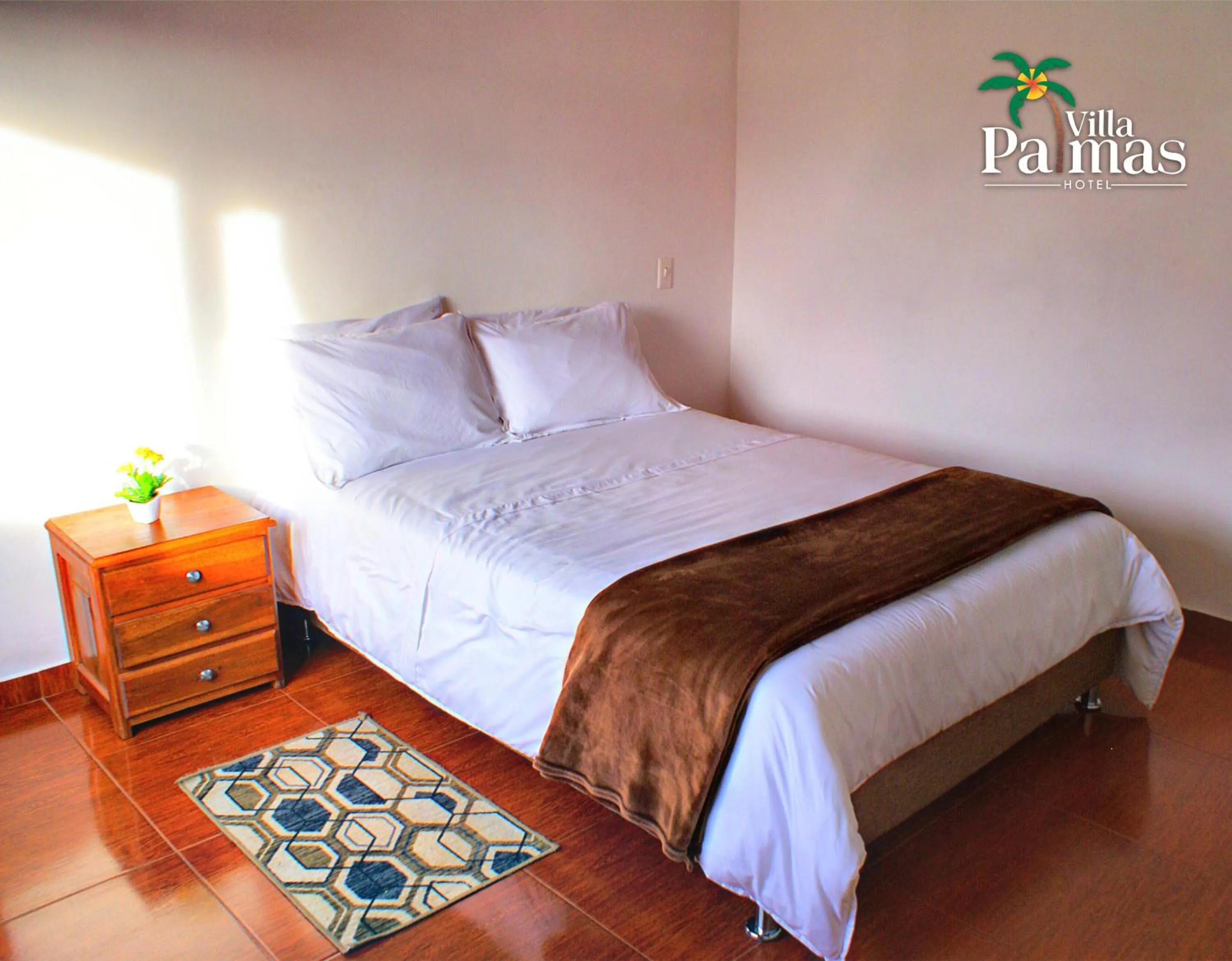 Bed in Hotel Villa Palmas