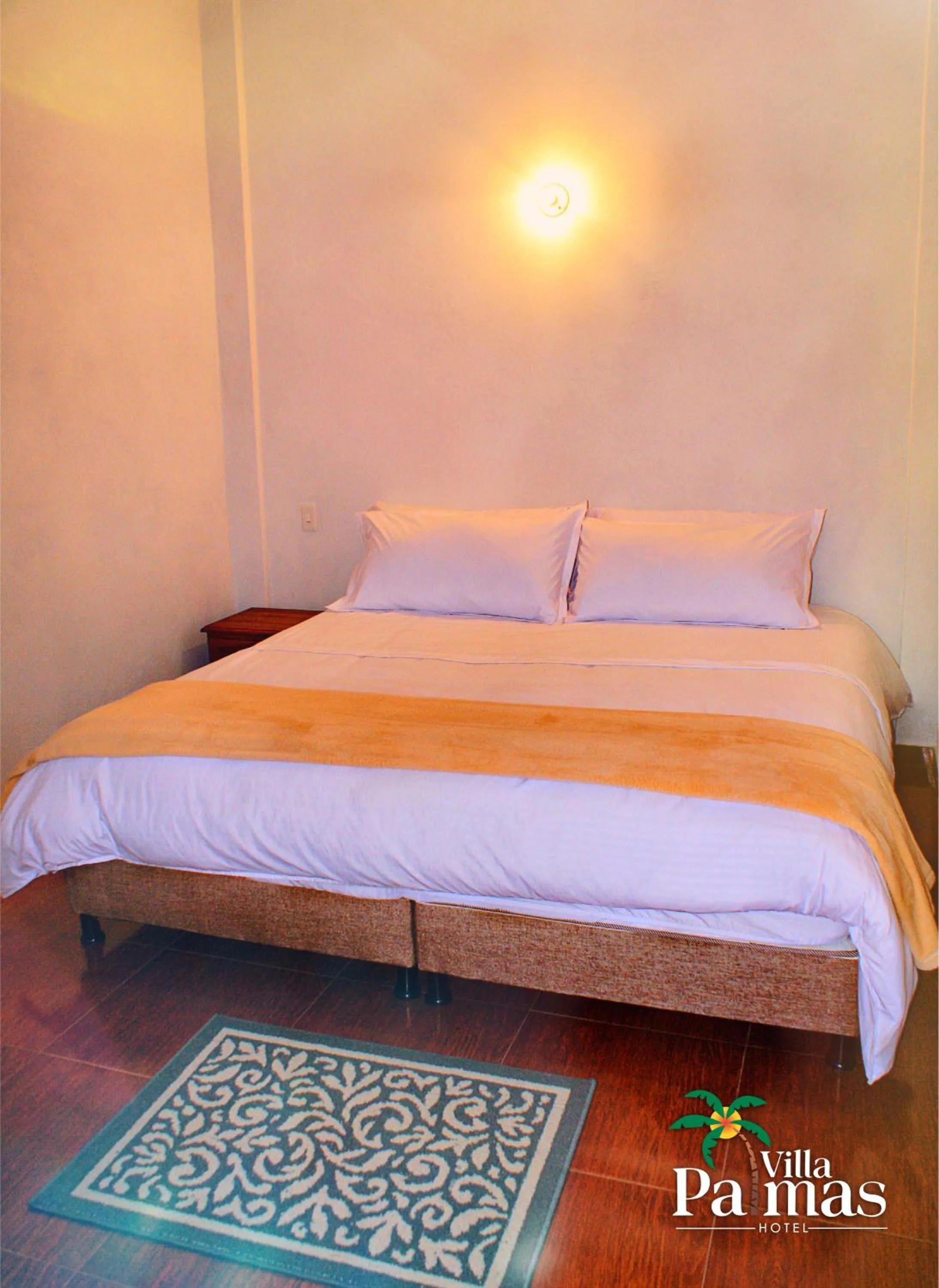 Bed in Hotel Villa Palmas