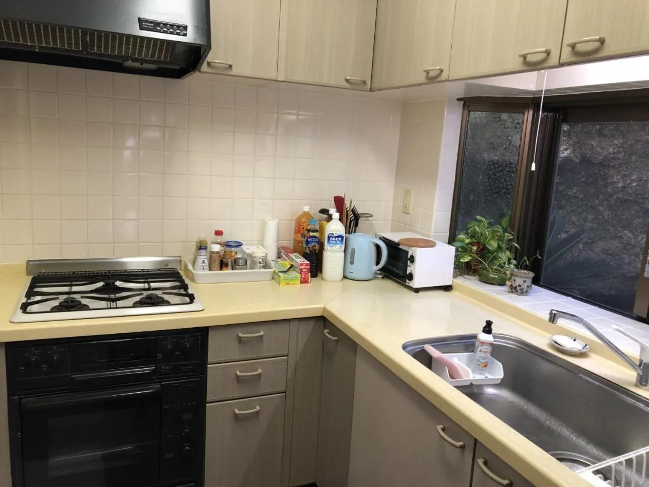 Kitchen or kitchenette in Beach House Yomitan